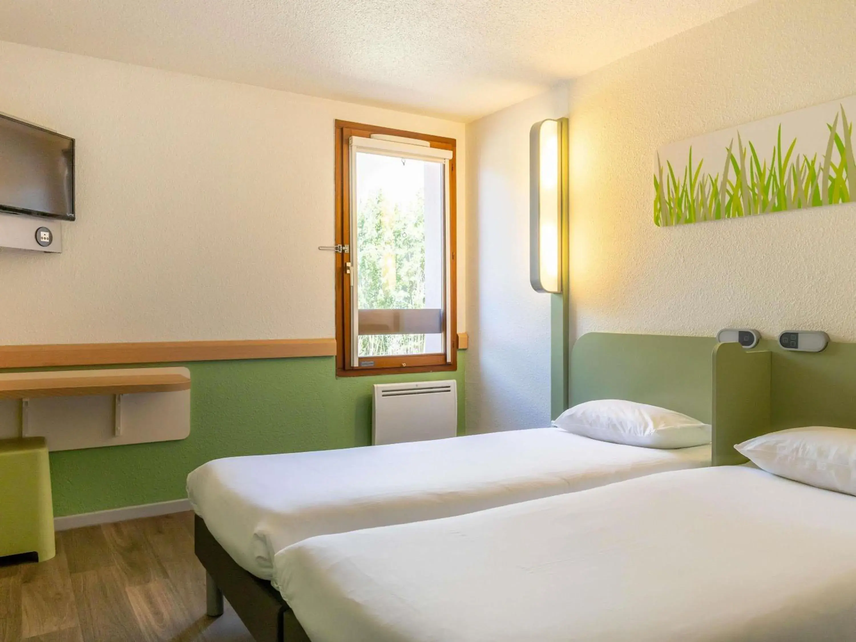 Twin Room in ibis budget Narbonne Sud A9/A61 Twin Room in ibis budget Narbonne Sud A9/A61