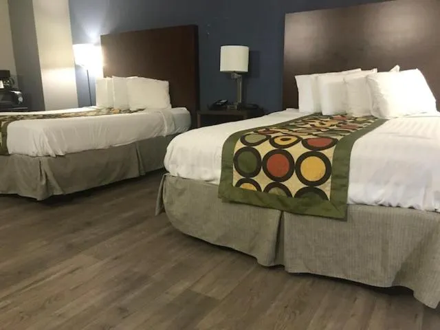 Bed in Alamar Resort Inn