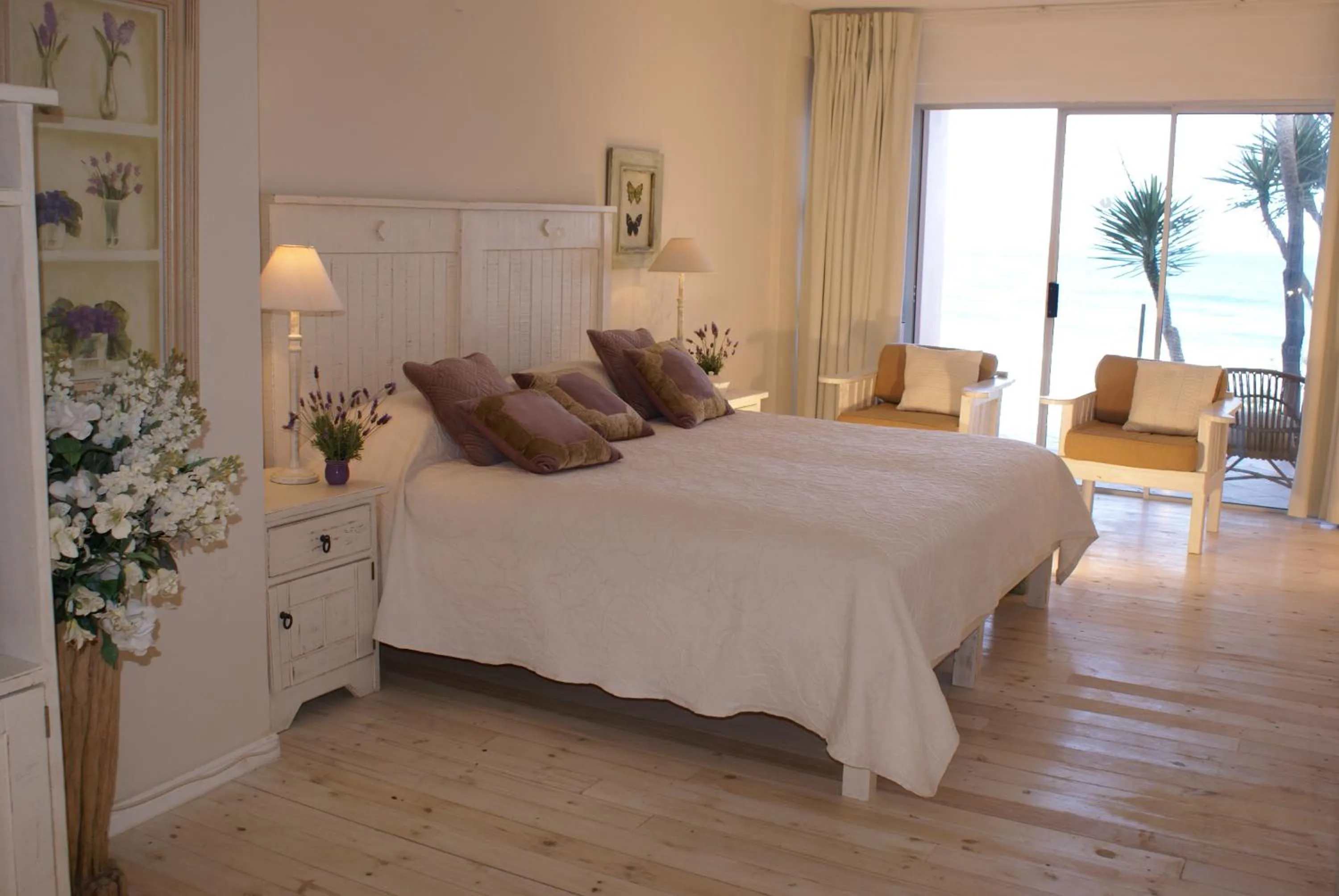 Photo of the whole room, Bed in The Pink Lodge on The Beach