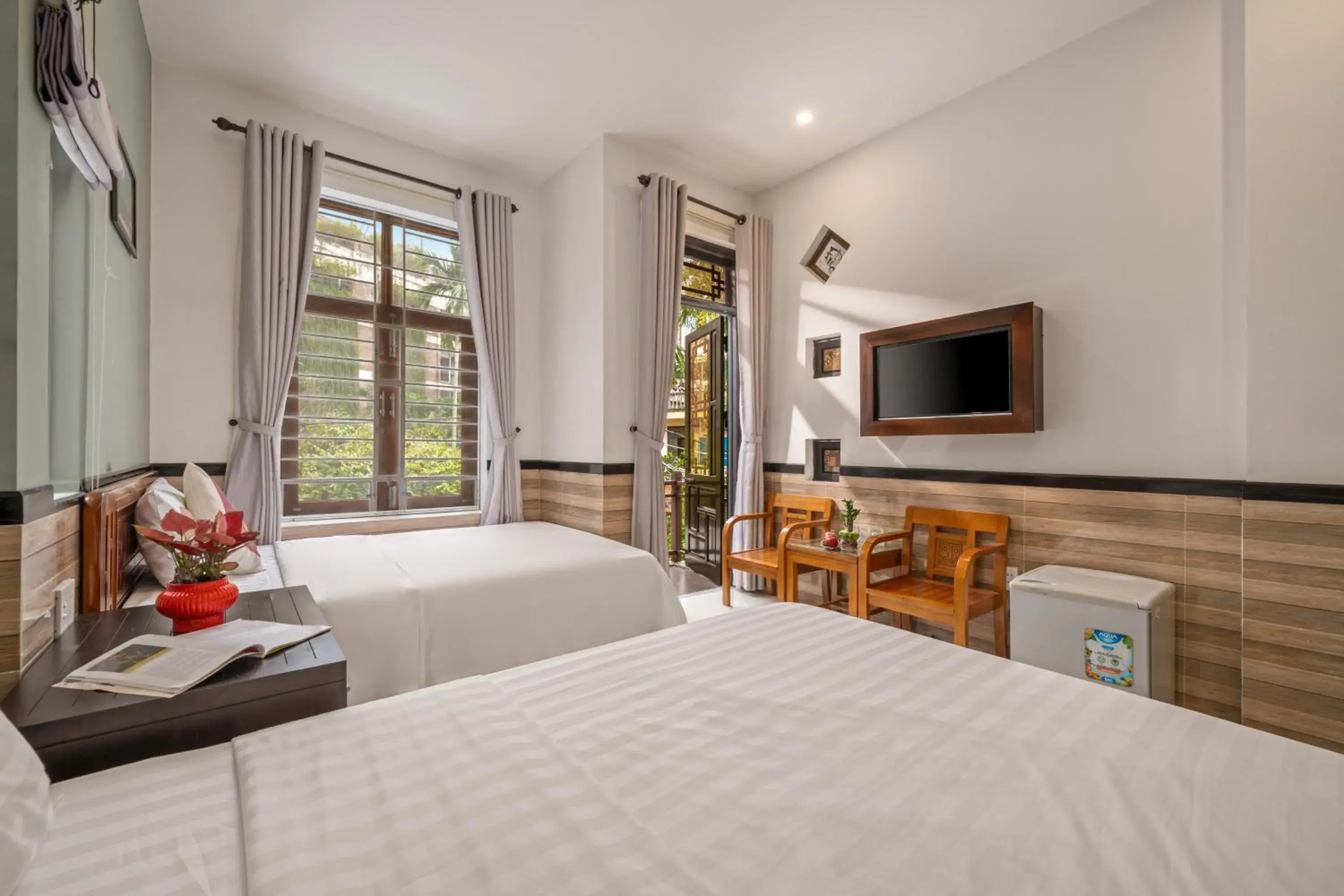 Triple Room with Garden View in Bo Bo Homestay Hoi An Triple Room with Garden View in Bo Bo Homestay Hoi An