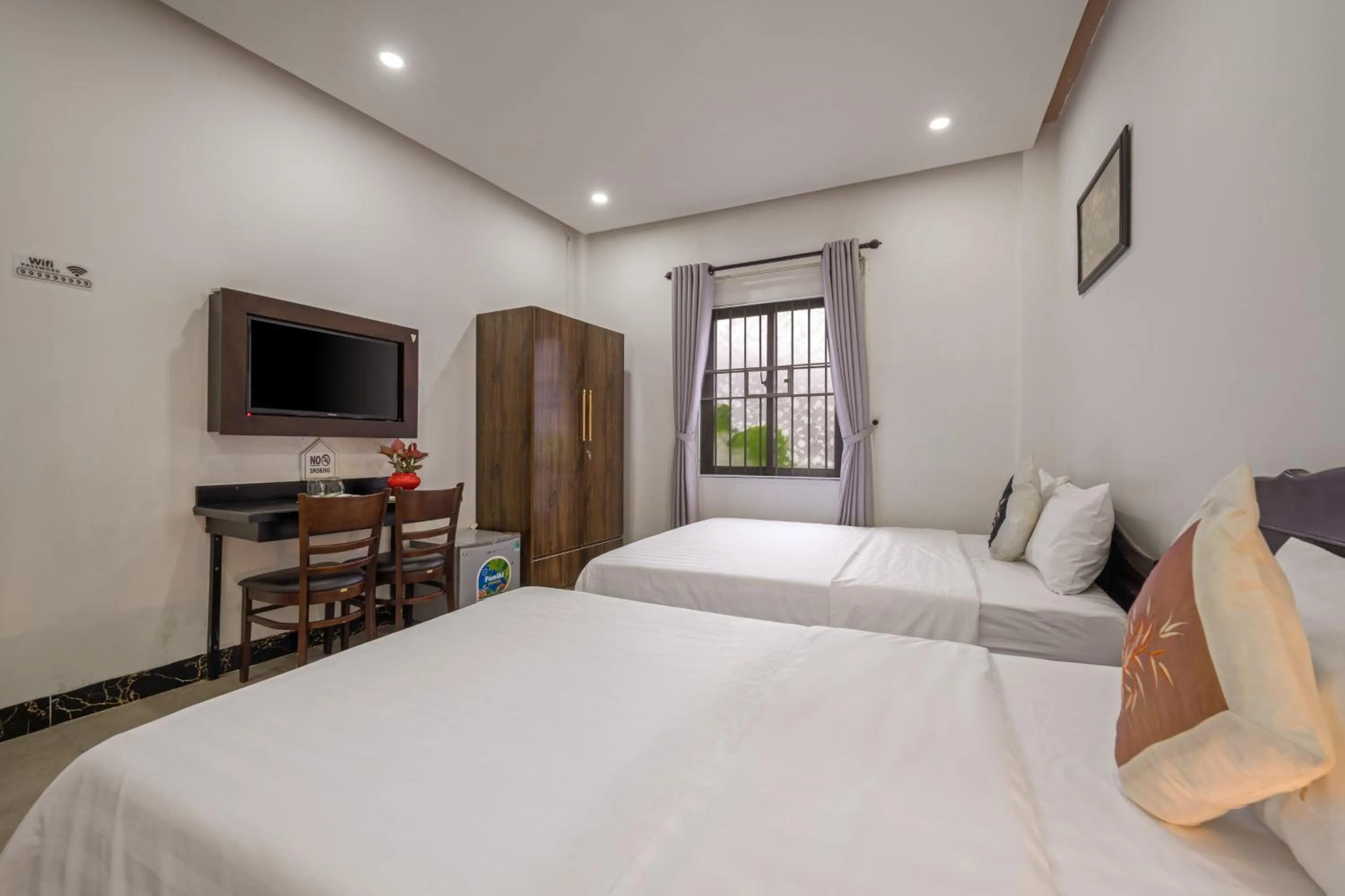 Communal lounge/ TV room, Bed in Bo Bo Homestay Hoi An
