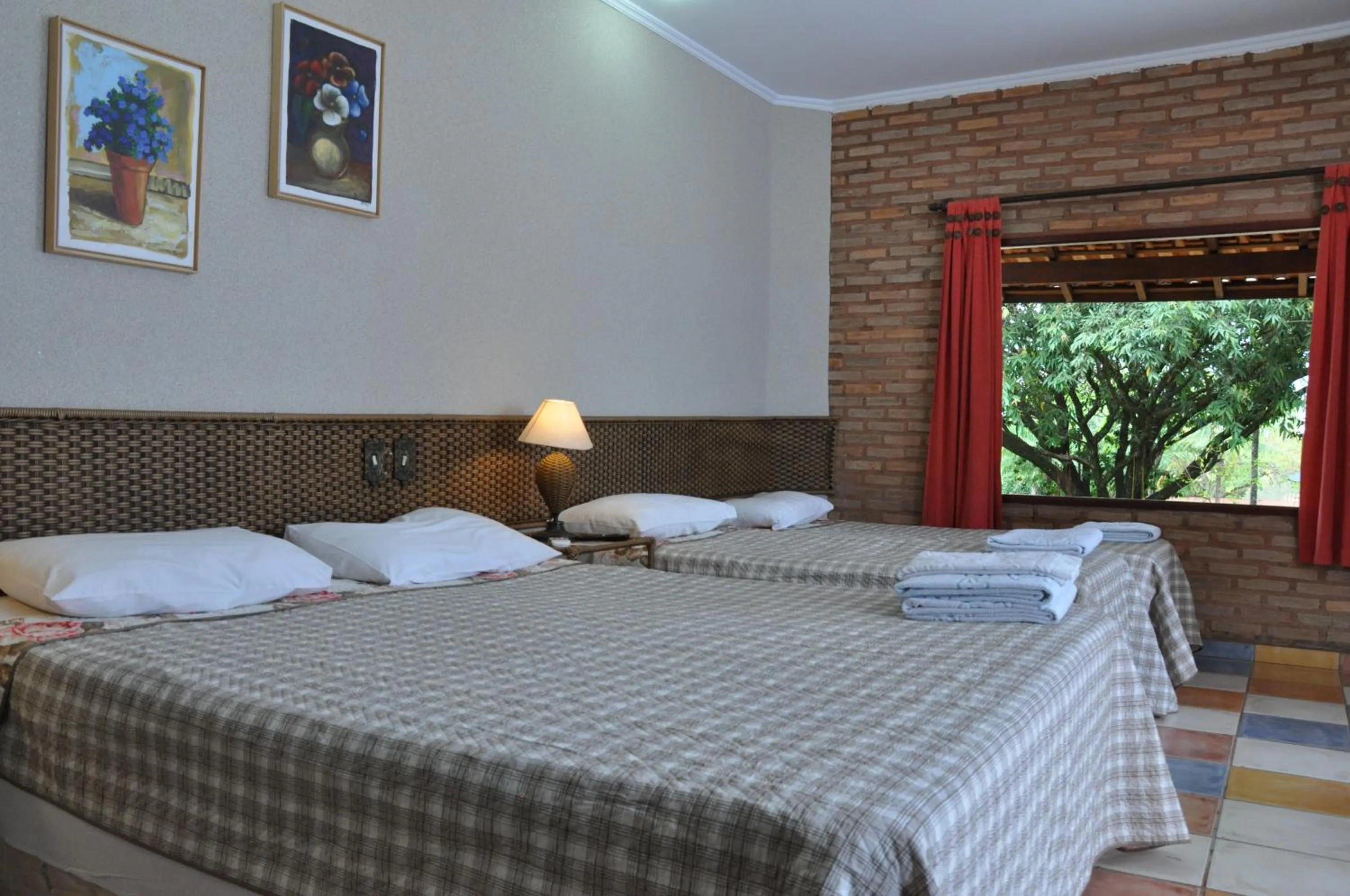 Bed in Pousada Beco da Lua