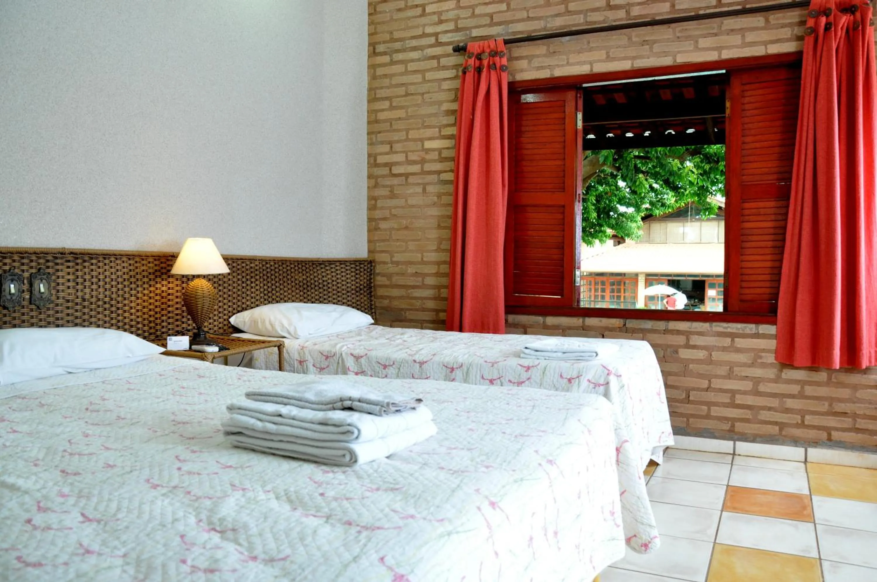 Bed in Pousada Beco da Lua