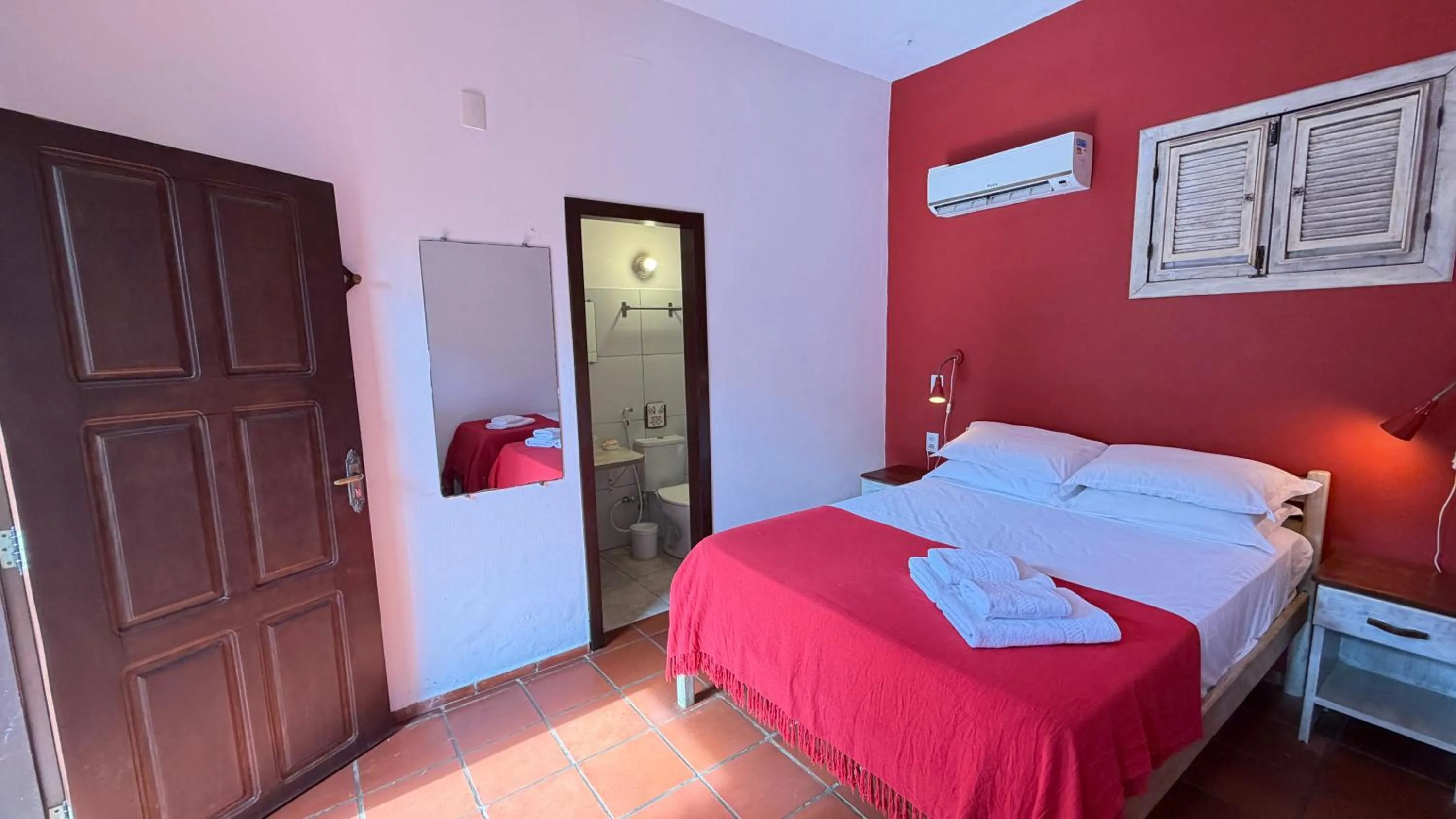 Bed in Pousada Atlantis