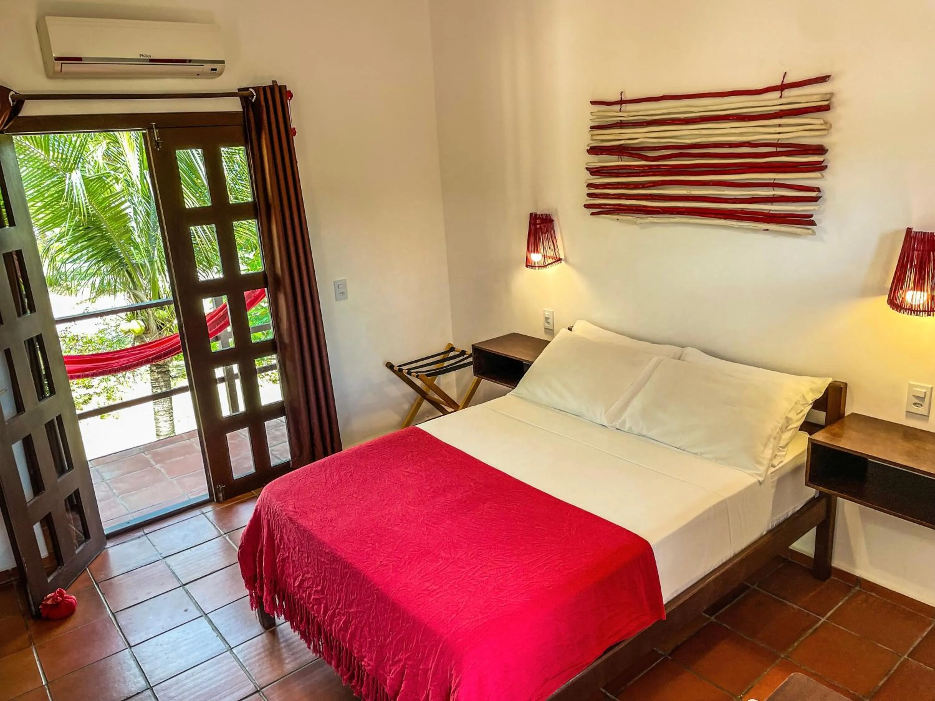 Bed in Pousada Atlantis