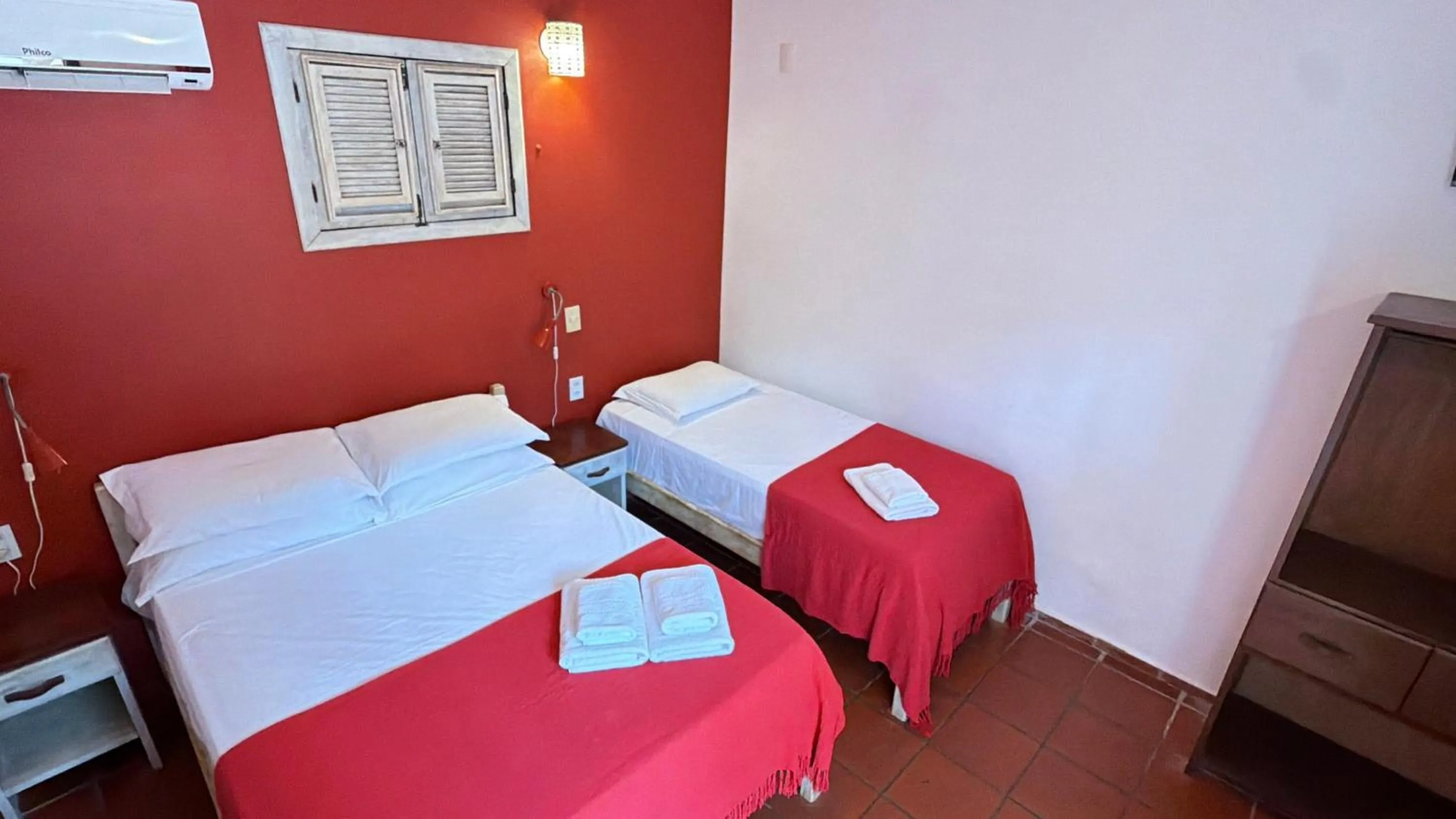 Bed in Pousada Atlantis