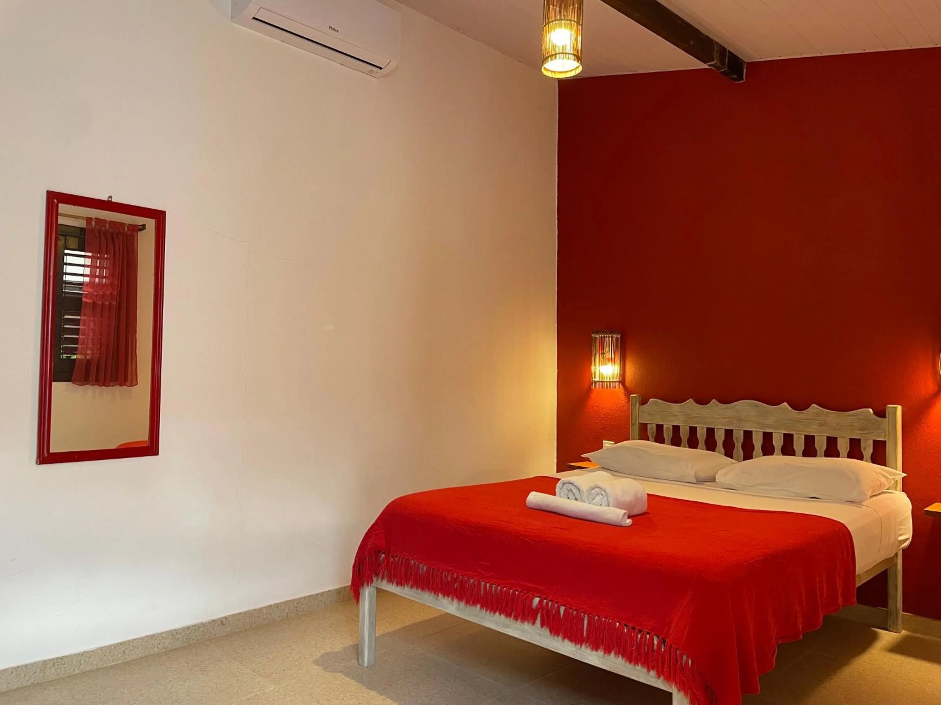 Bed in Pousada Atlantis