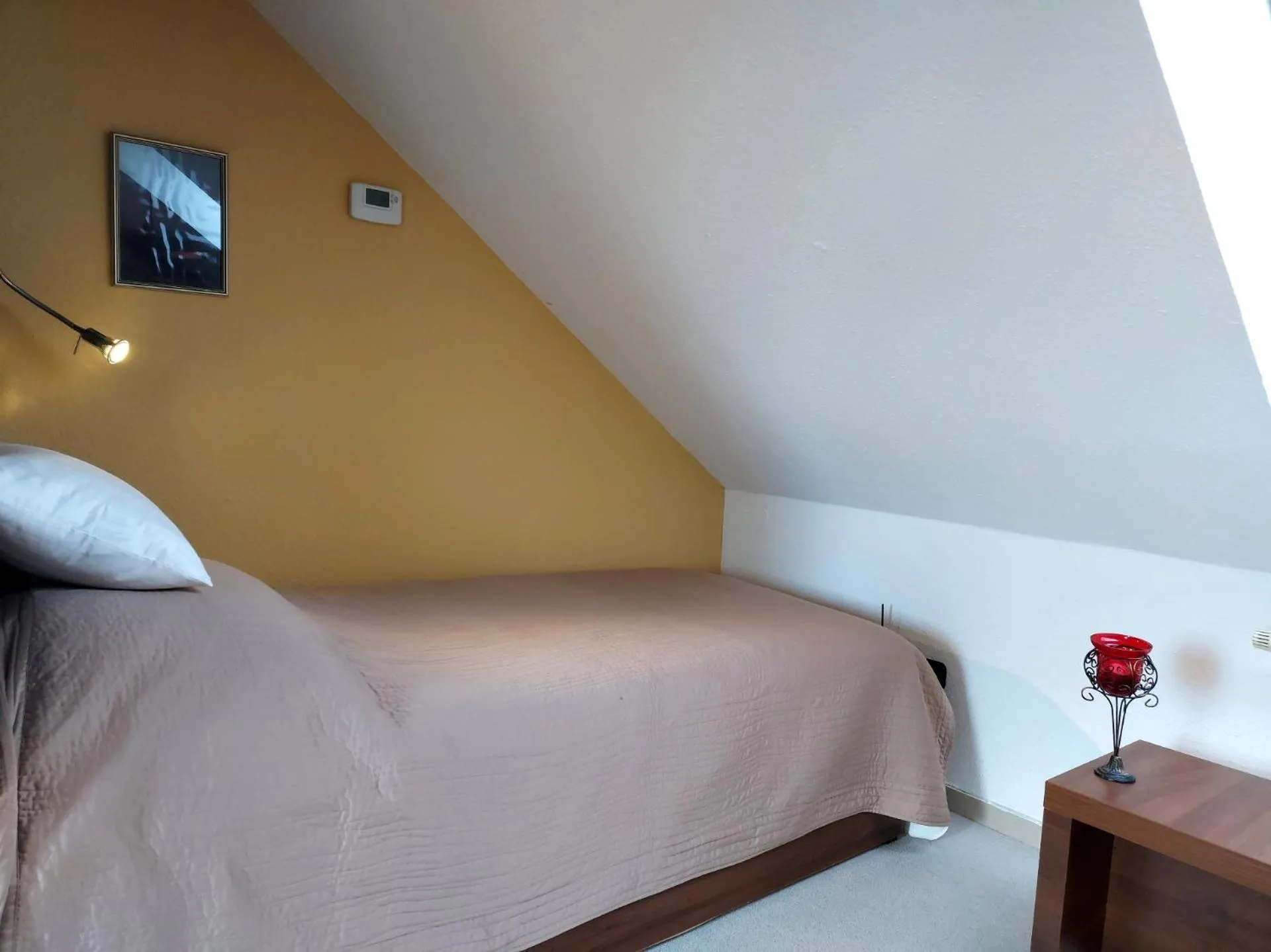 Bed in A Mecsek Gyöngye Apartmanhaz
