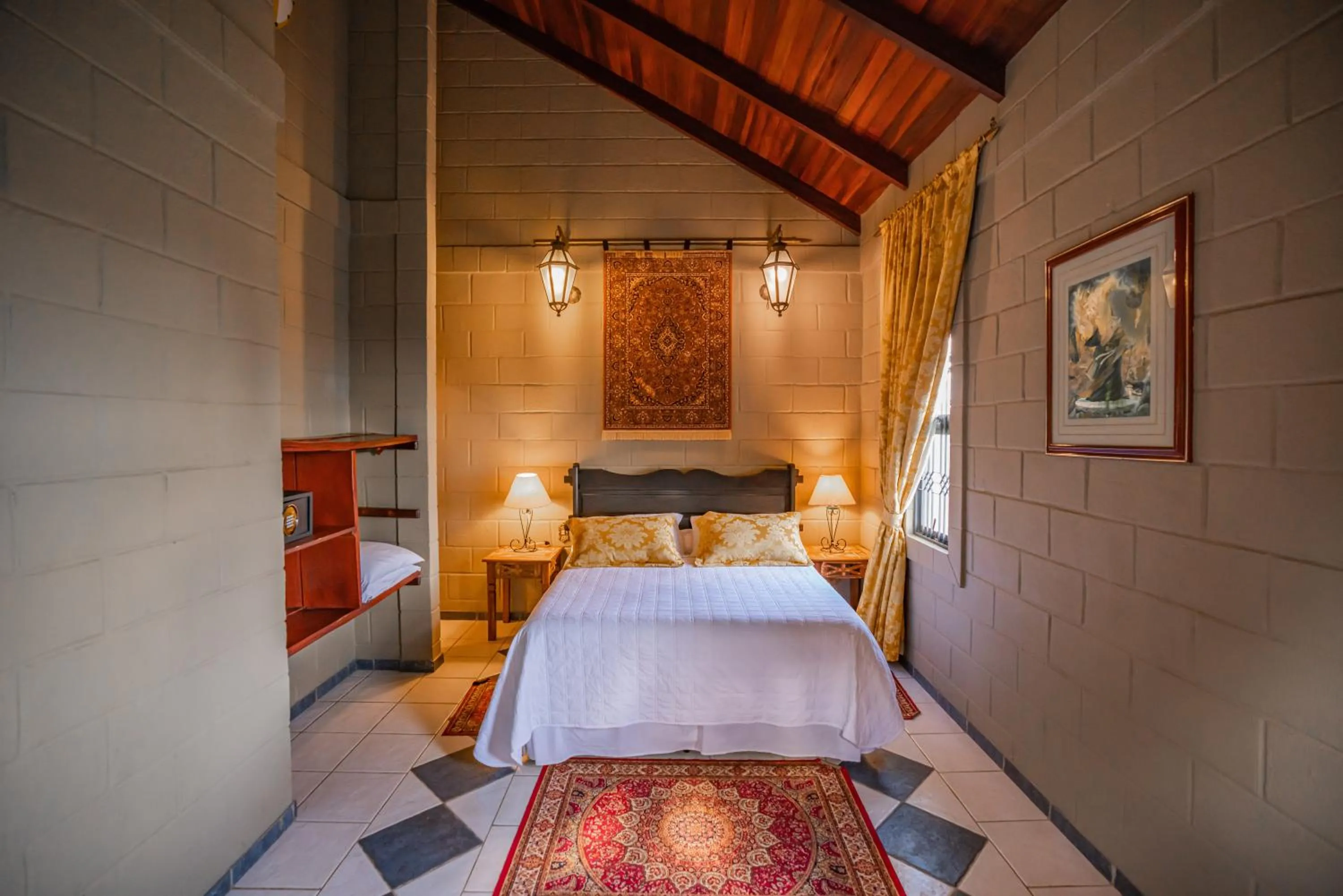 Bedroom, Bed in Pousada Camelot Inn