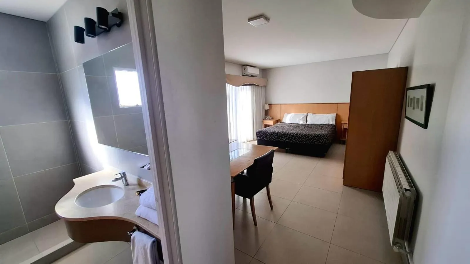 Bed in Urbana Suites