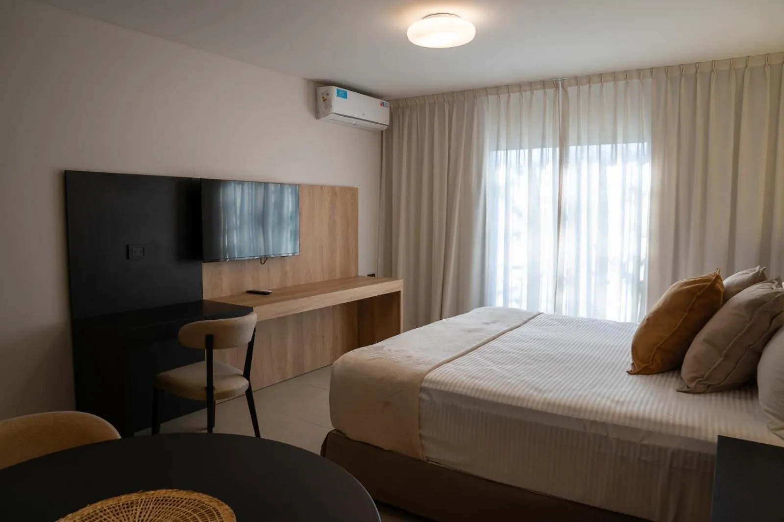 Bed in Urbana Suites