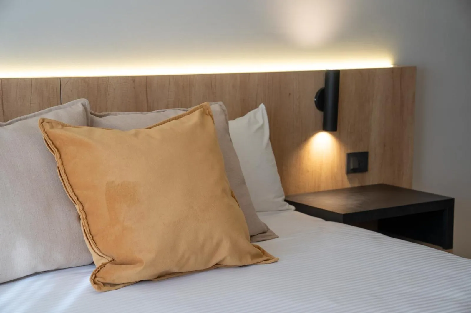 Bed in Urbana Suites