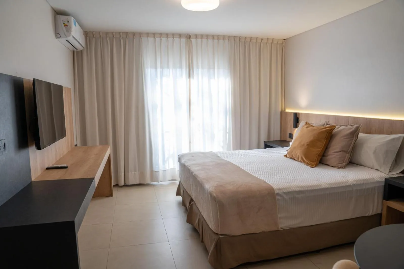 Bed in Urbana Suites