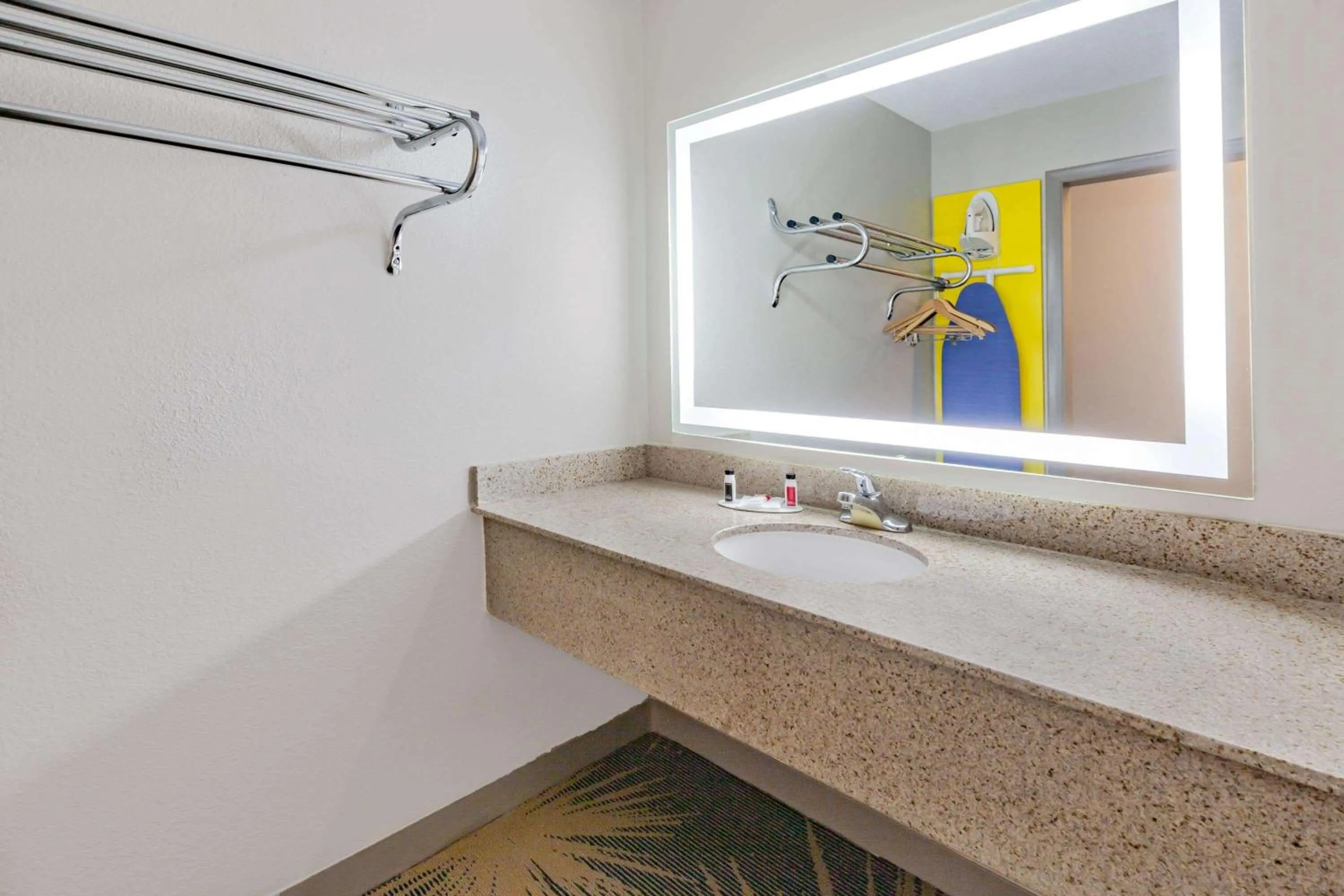 Bathroom in Days Inn by Wyndham Roanoke Hollins Near I-81