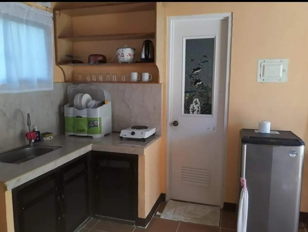 Kitchen or kitchenette in Gardenview Homestay Siargao