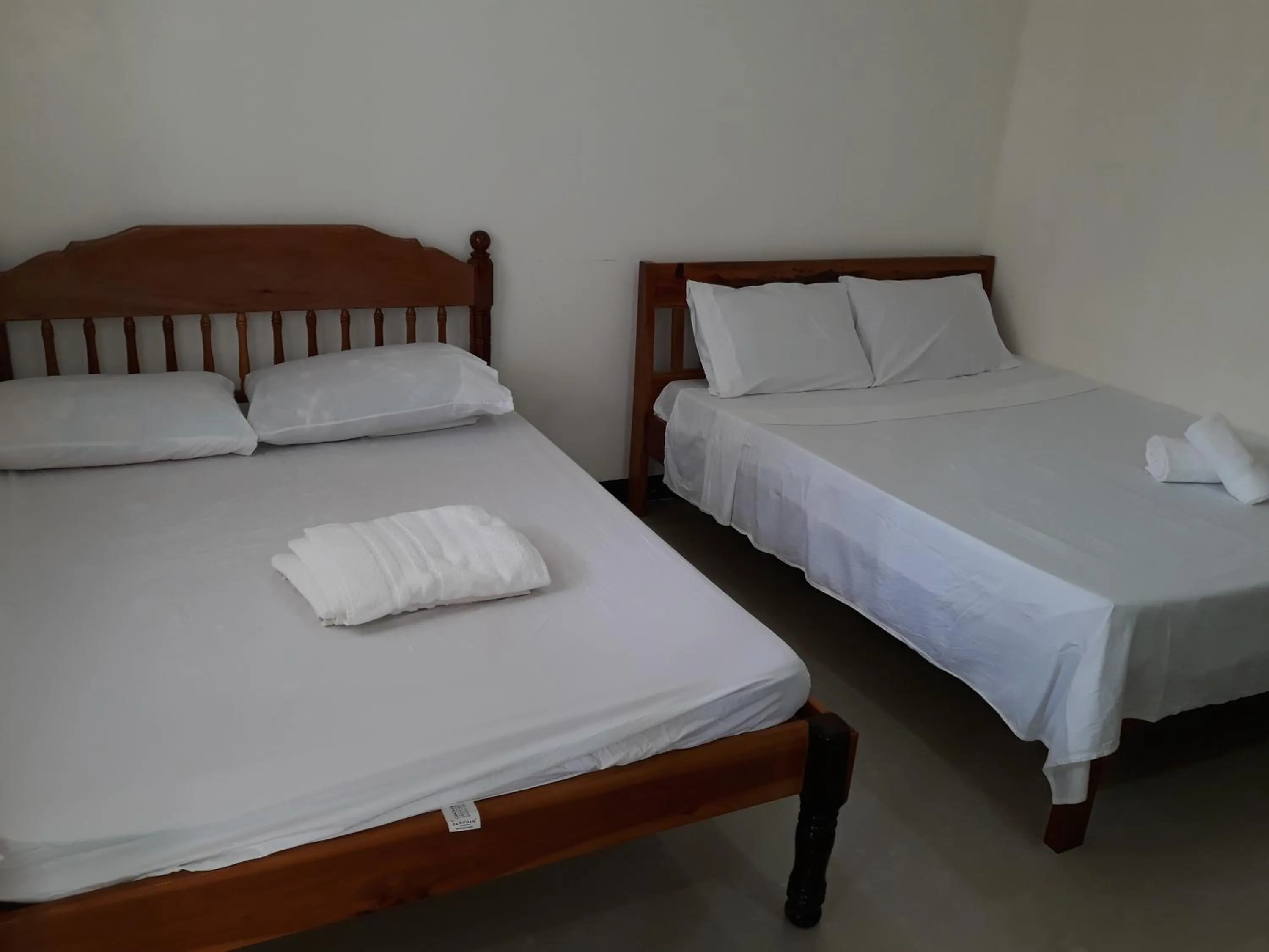 Photo of the whole room, Bed in Gardenview Homestay Siargao