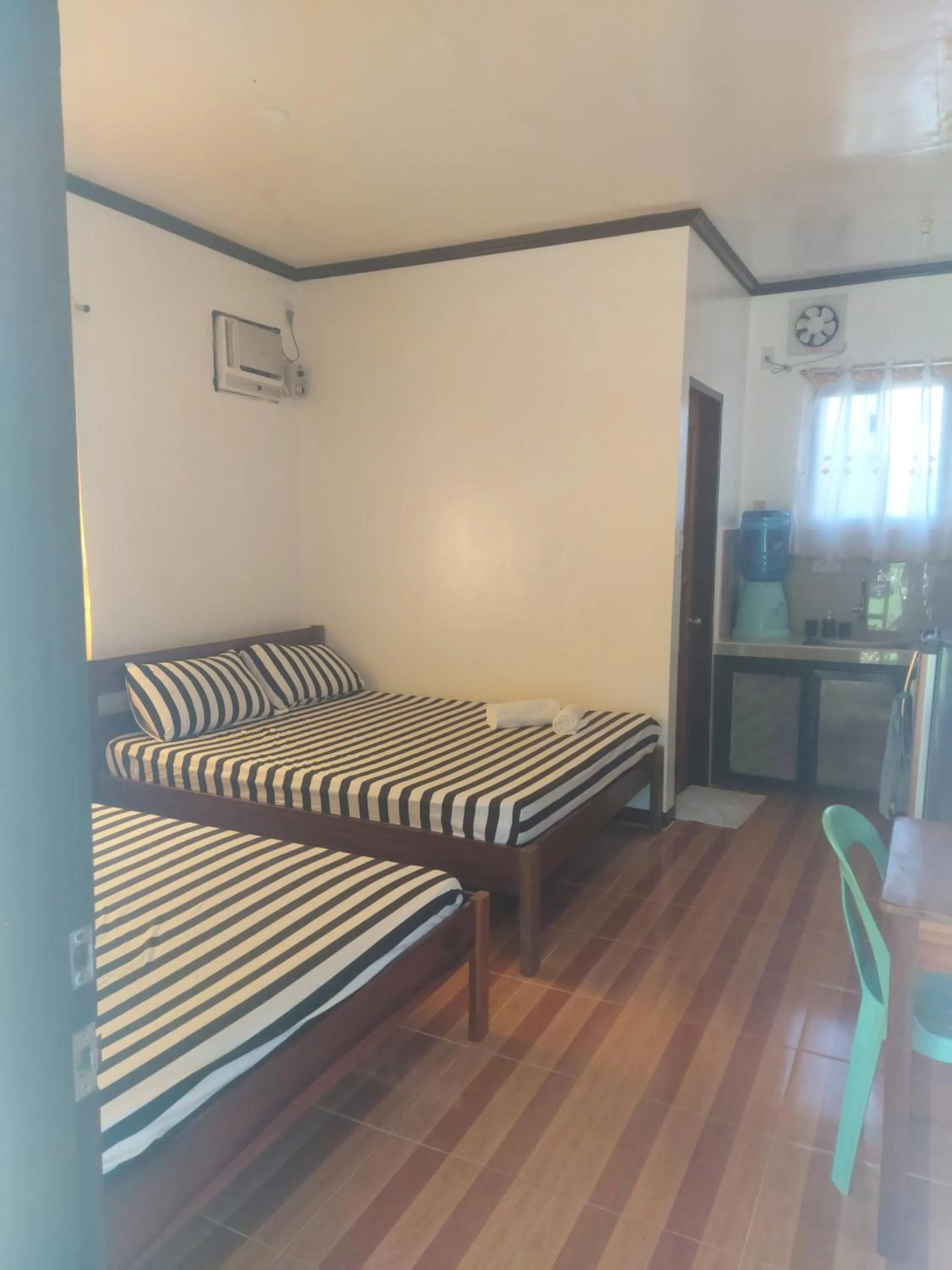 Photo of the whole room, Bed in Gardenview Homestay Siargao