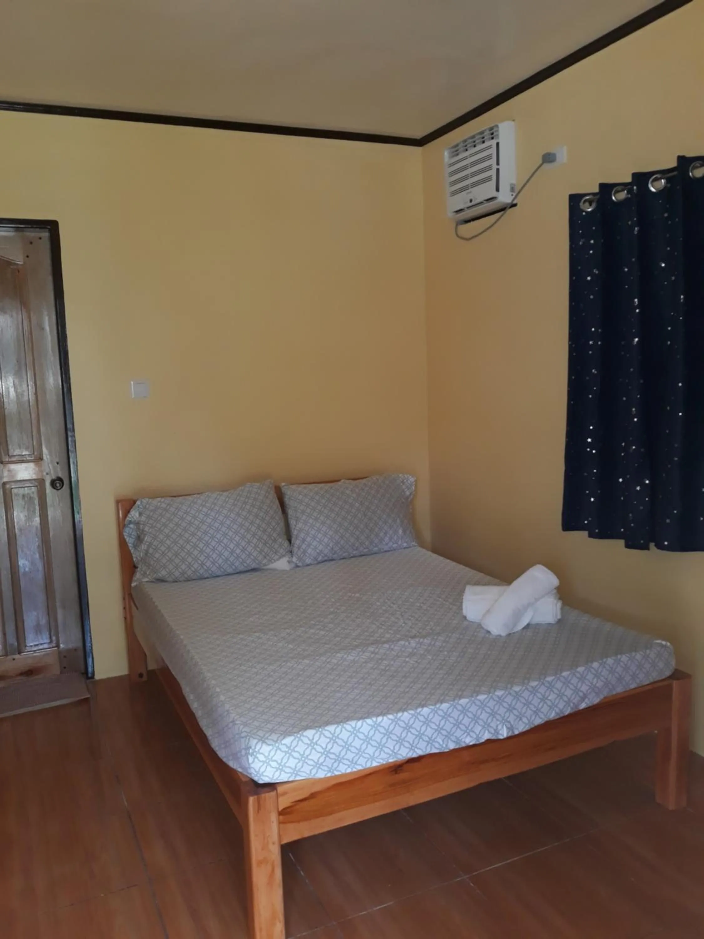 Bed in Gardenview Homestay Siargao