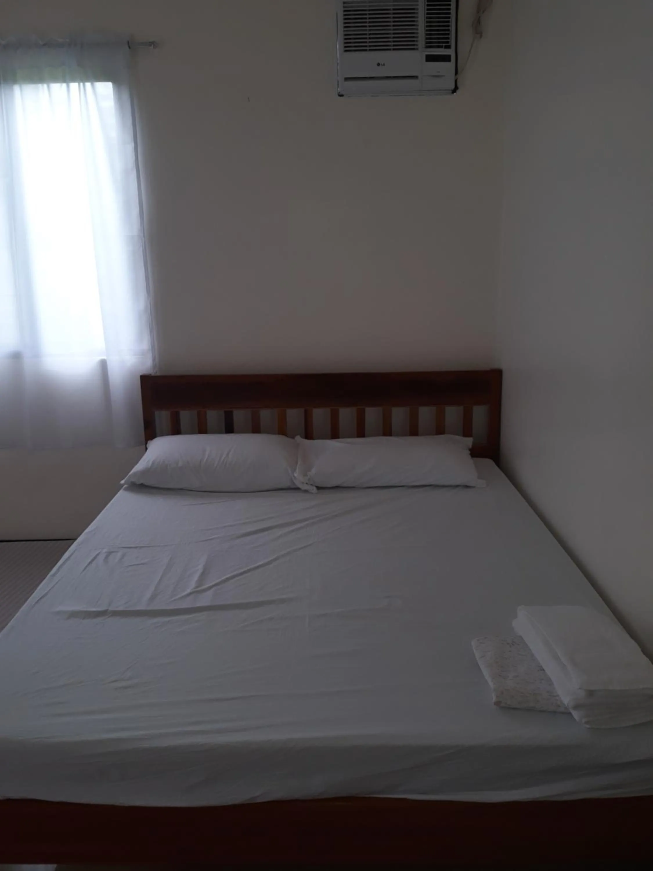 Photo of the whole room, Bed in Gardenview Homestay Siargao