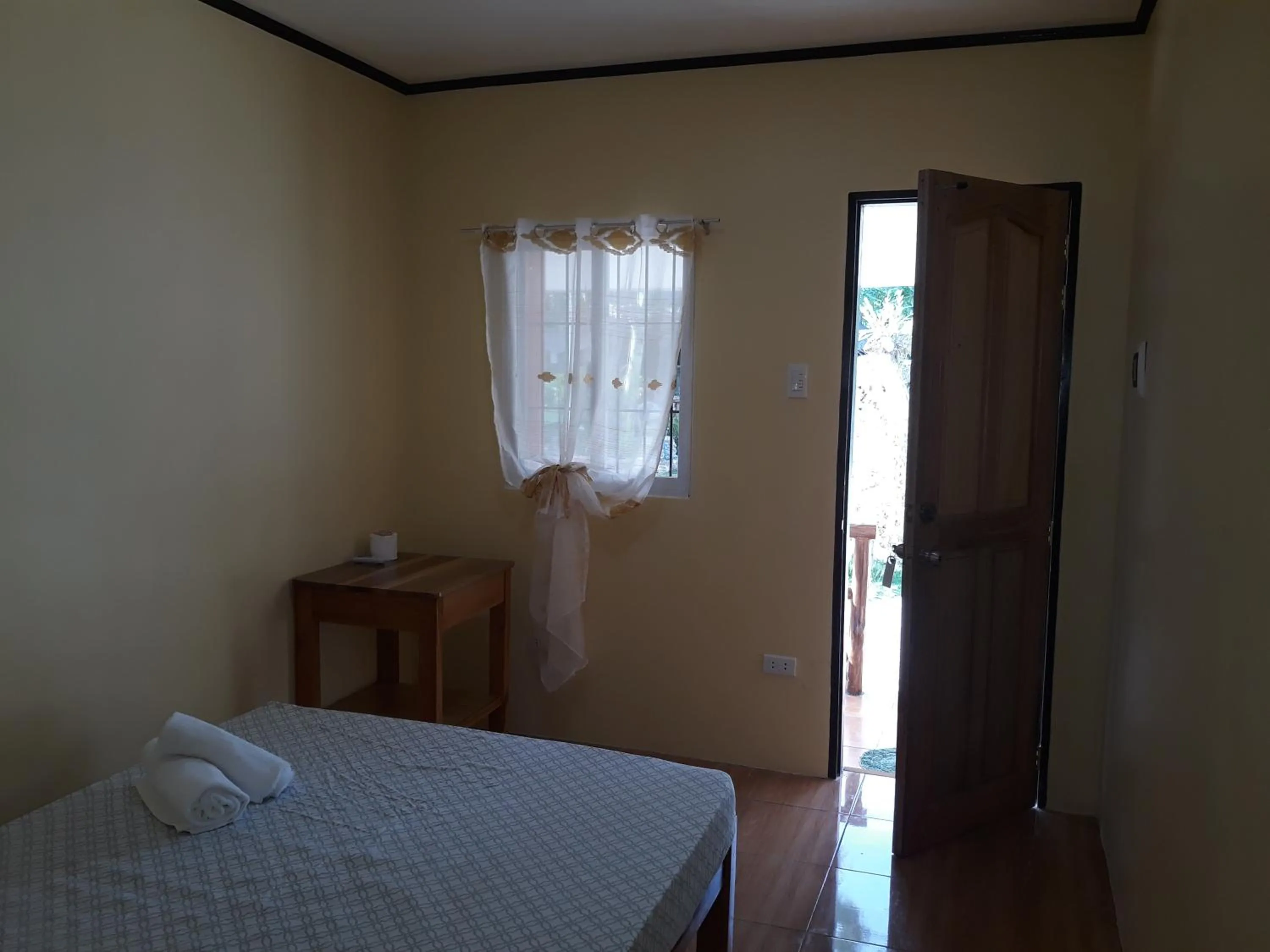 Photo of the whole room, Bed in Gardenview Homestay Siargao