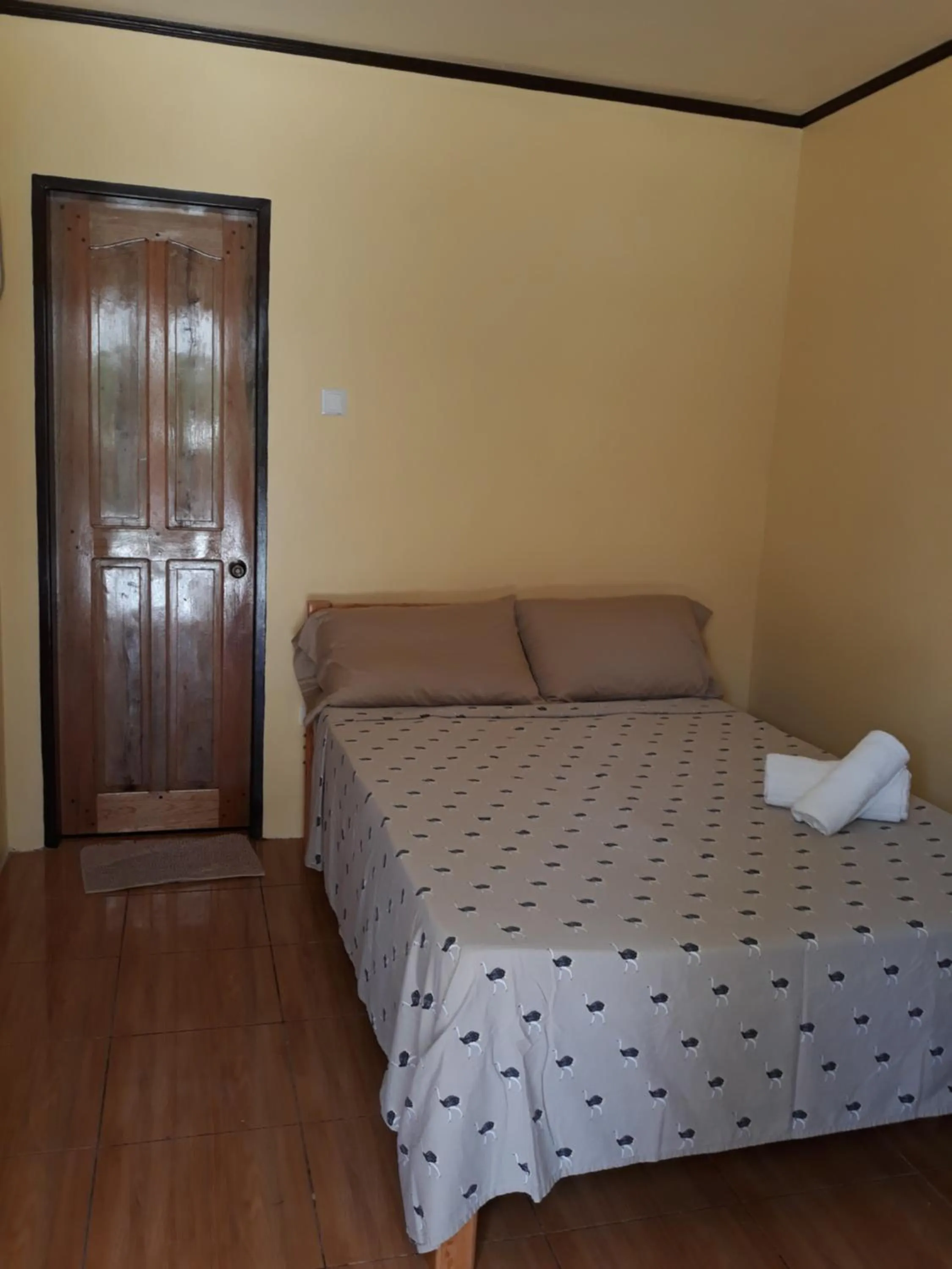 Photo of the whole room, Bed in Gardenview Homestay Siargao