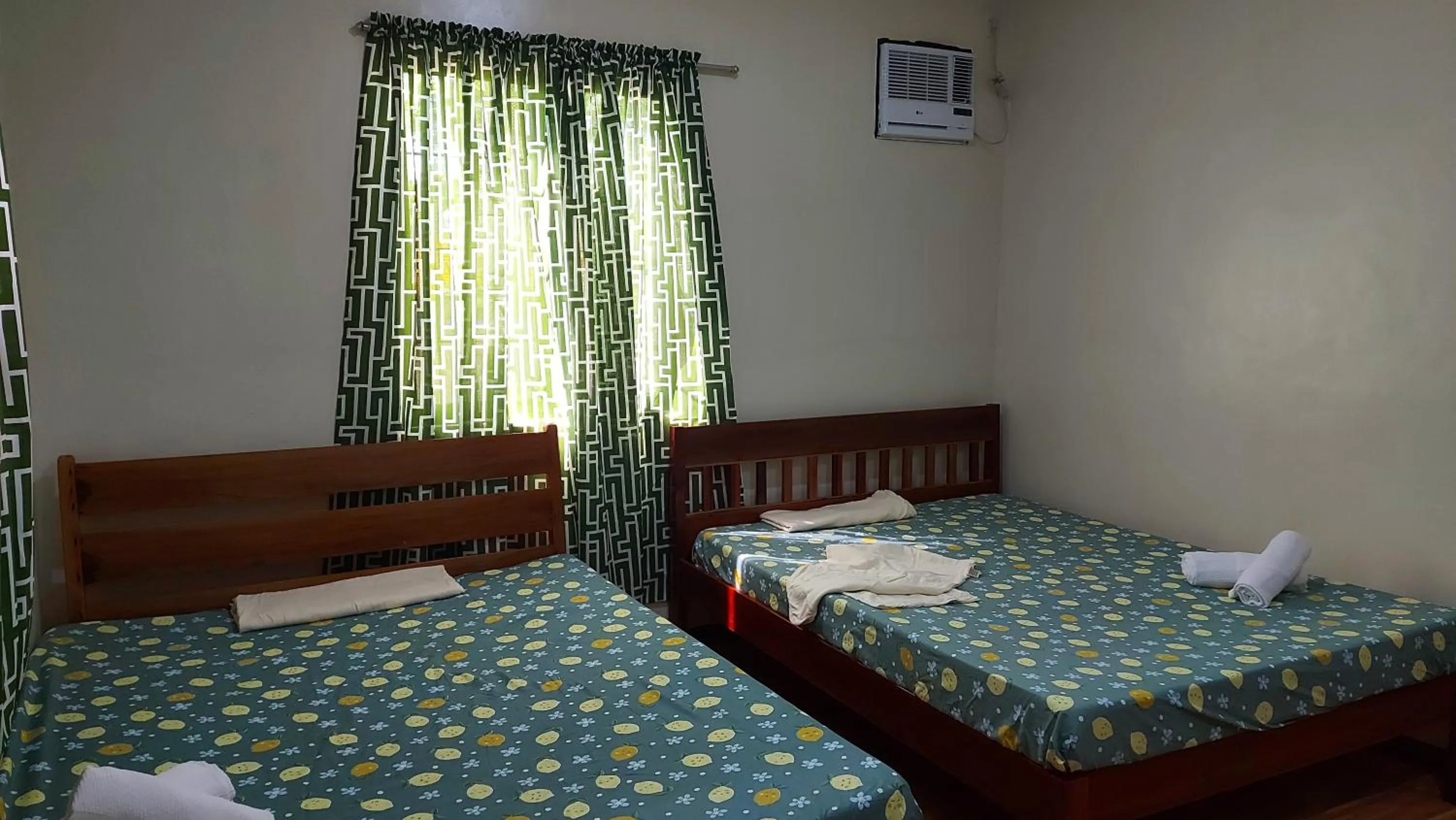 Photo of the whole room, Bed in Gardenview Homestay Siargao