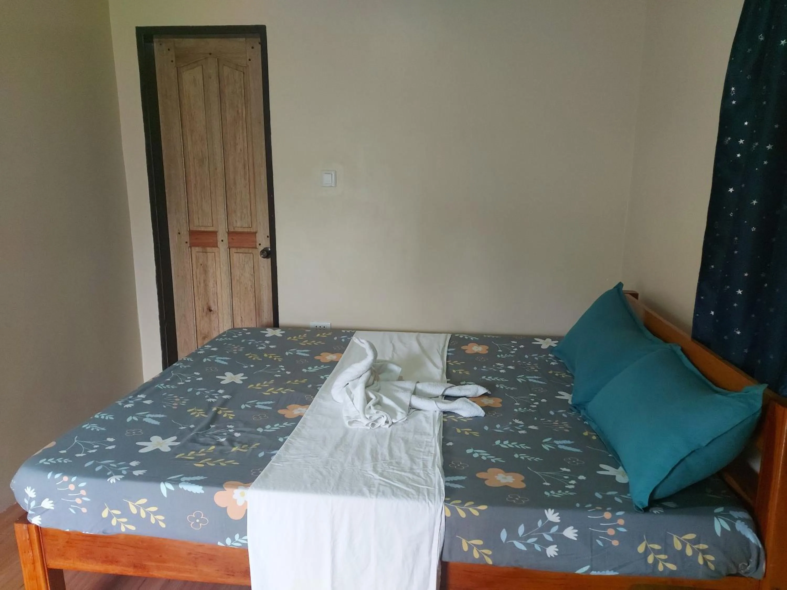 Bed in Gardenview Homestay Siargao