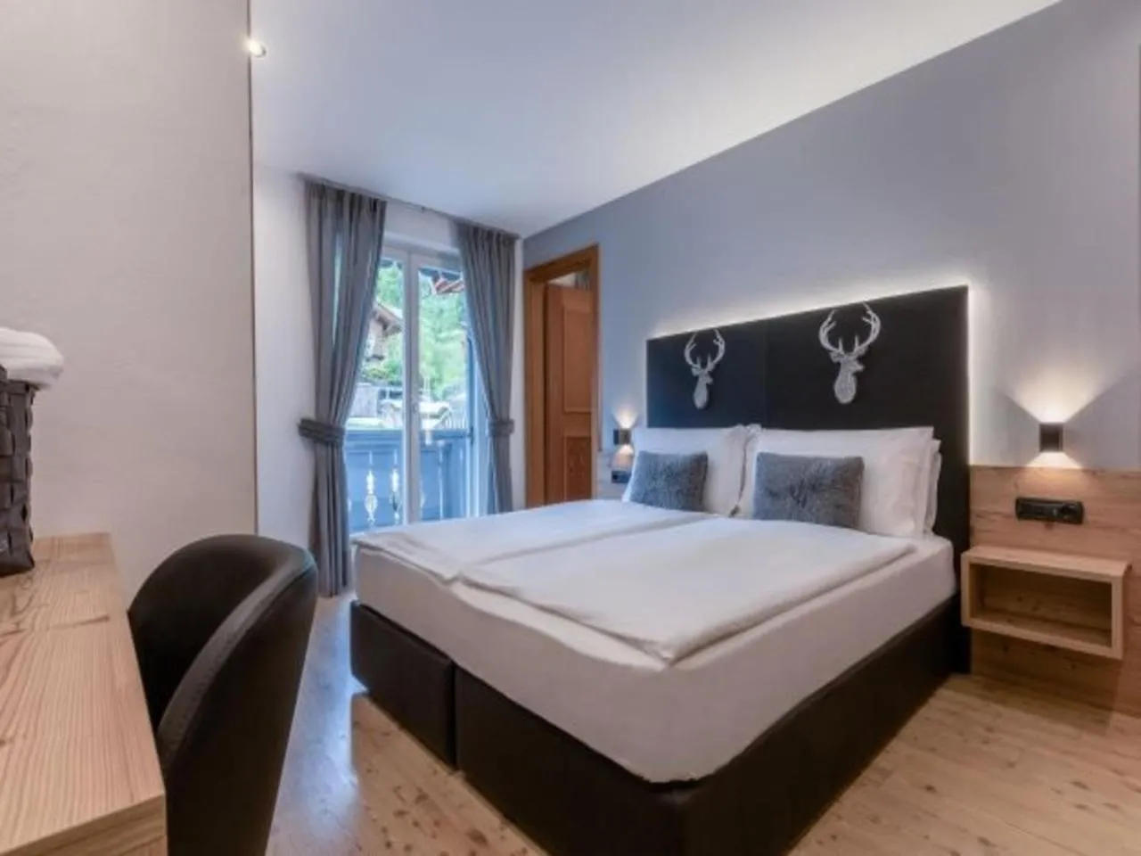 Bed in Hotel Madonnina Resort And Wellness