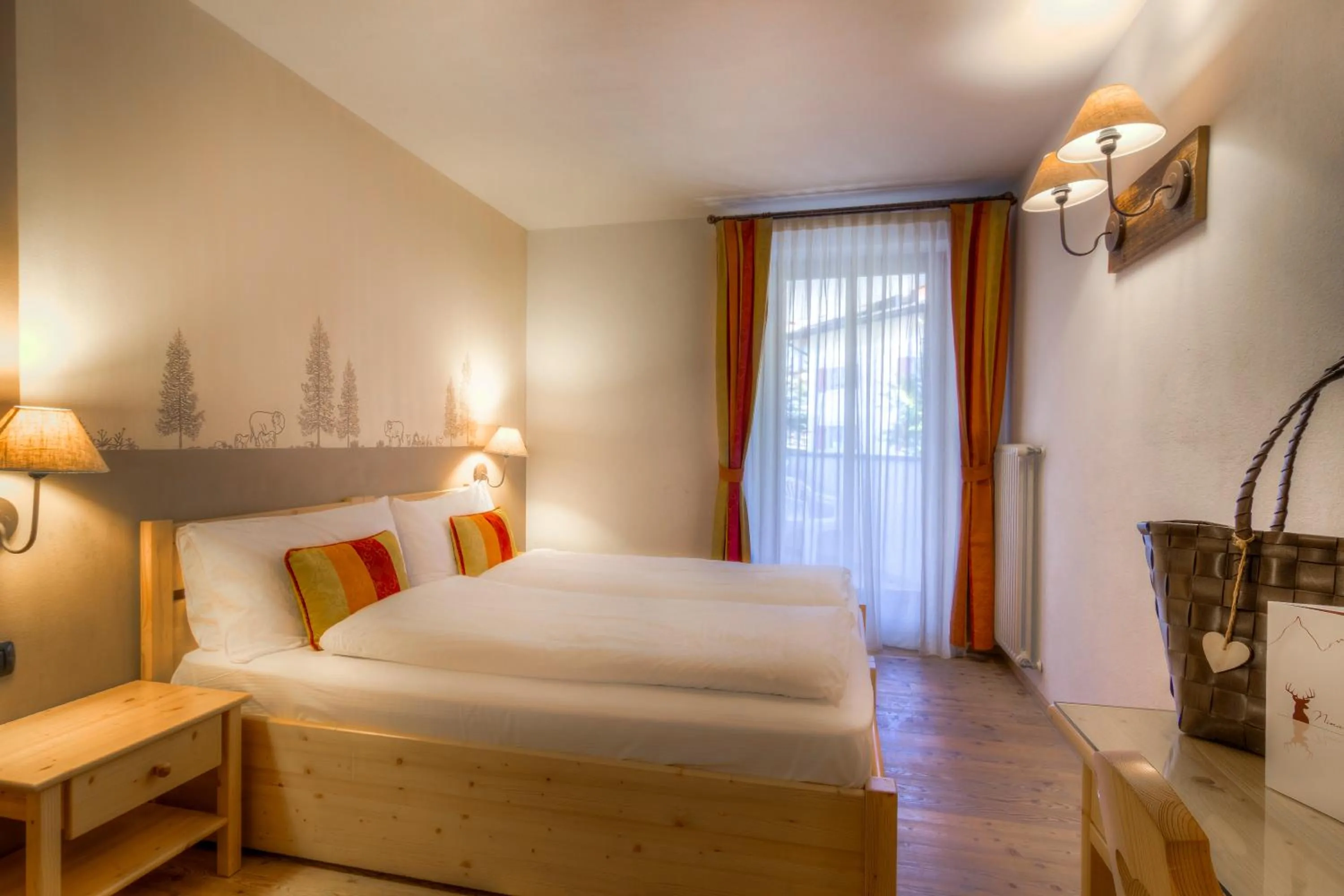 Bed in Hotel Madonnina Resort And Wellness