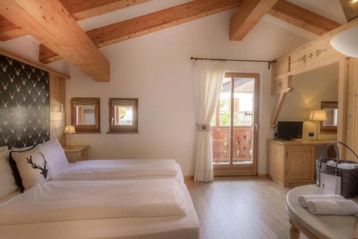 Bed in Hotel Madonnina Resort And Wellness