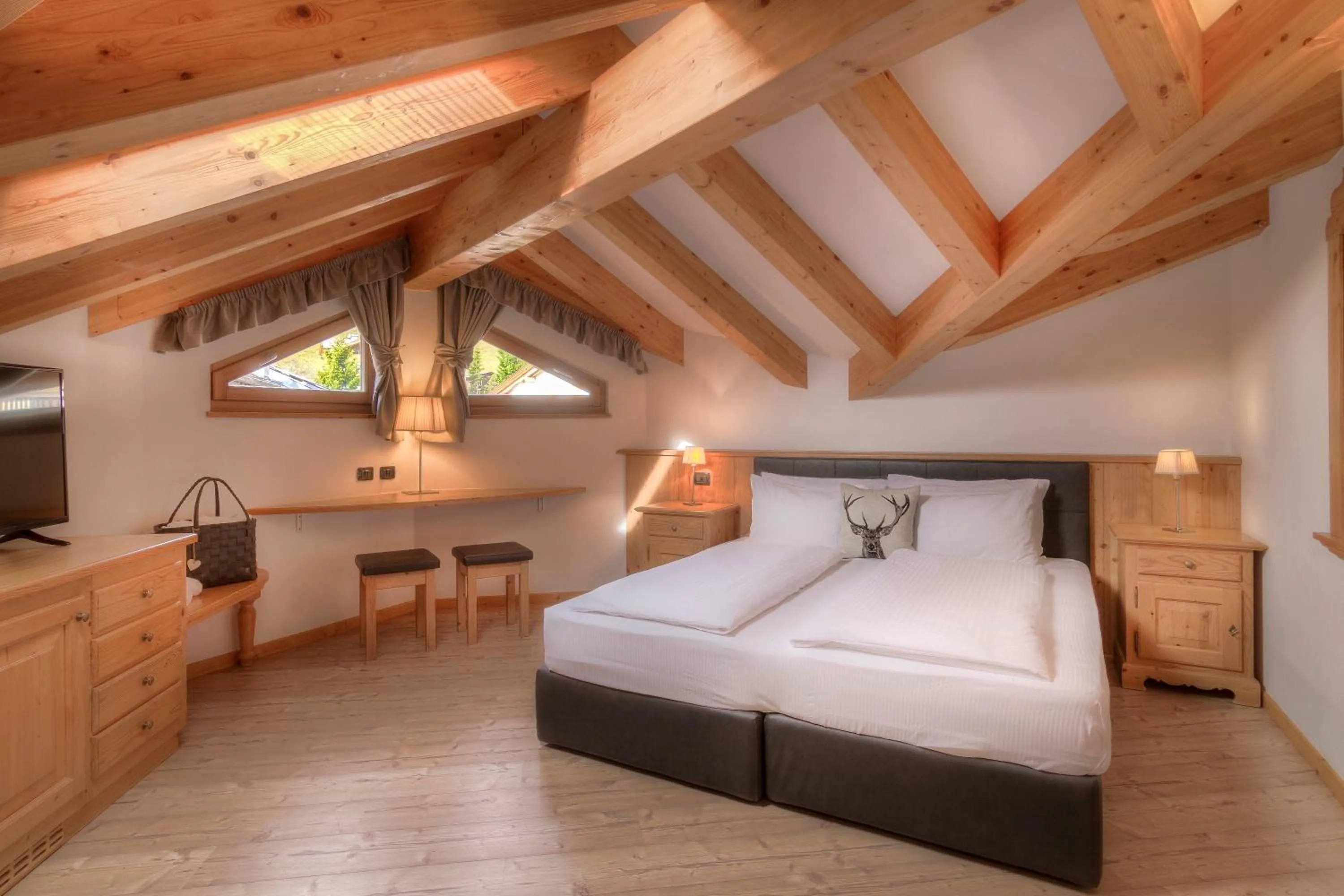 Bed in Hotel Madonnina Resort And Wellness