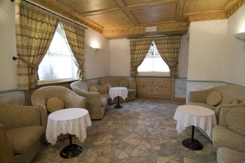 Communal lounge/ TV room in Hotel Madonnina Resort And Wellness