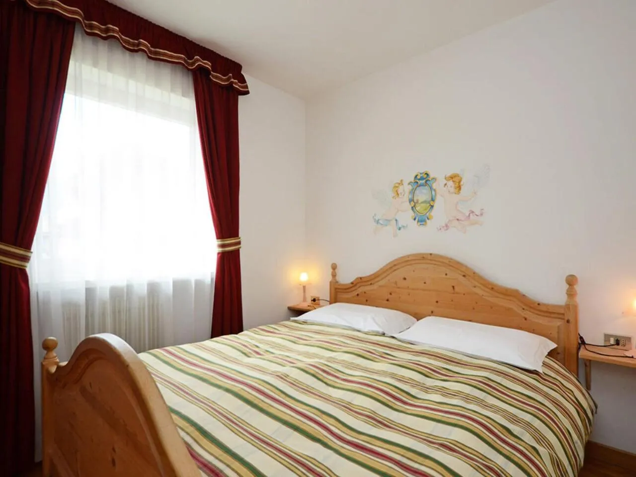 Bed in Hotel Madonnina Resort And Wellness