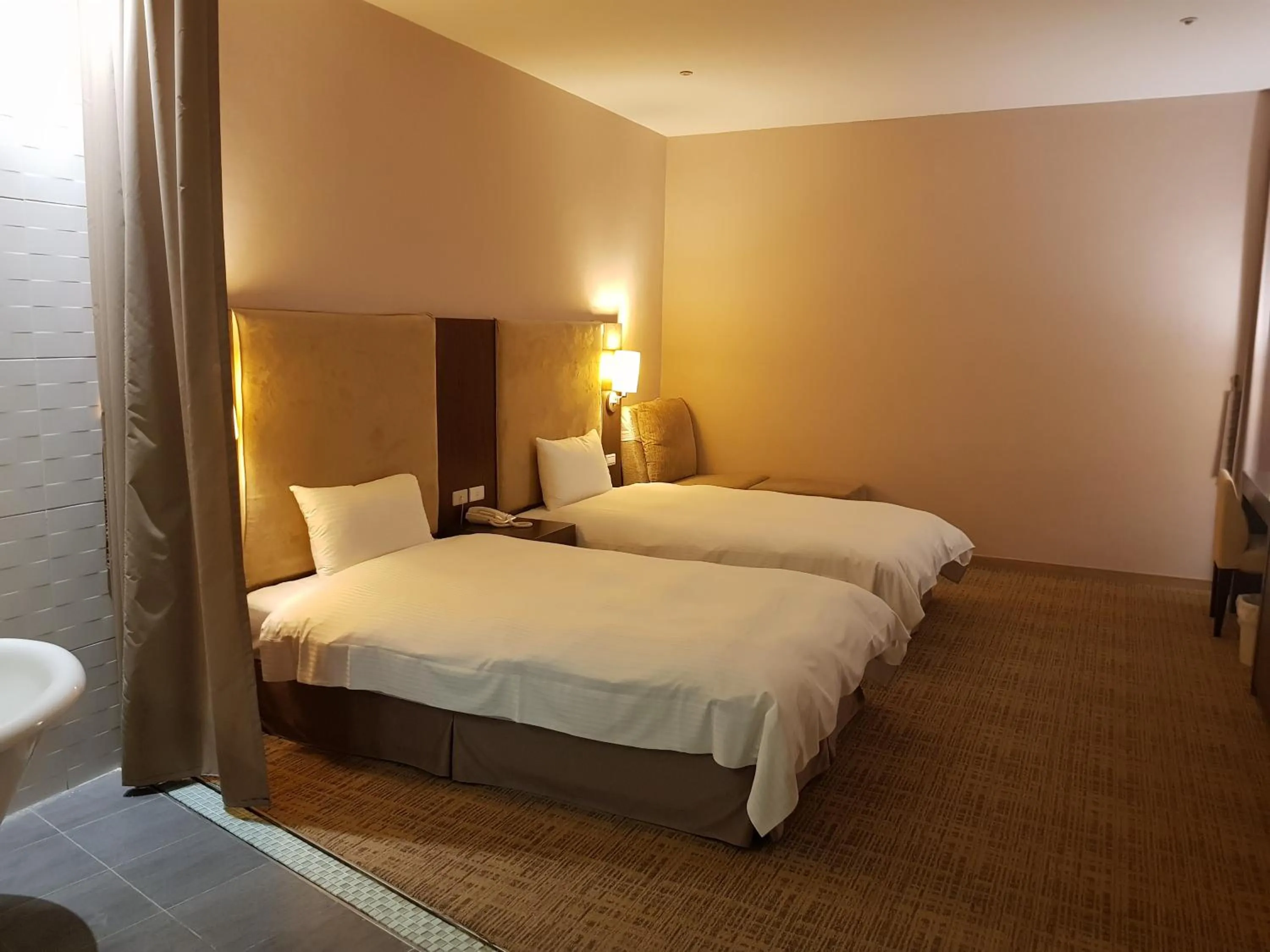 Bed in Kavalan Hotel