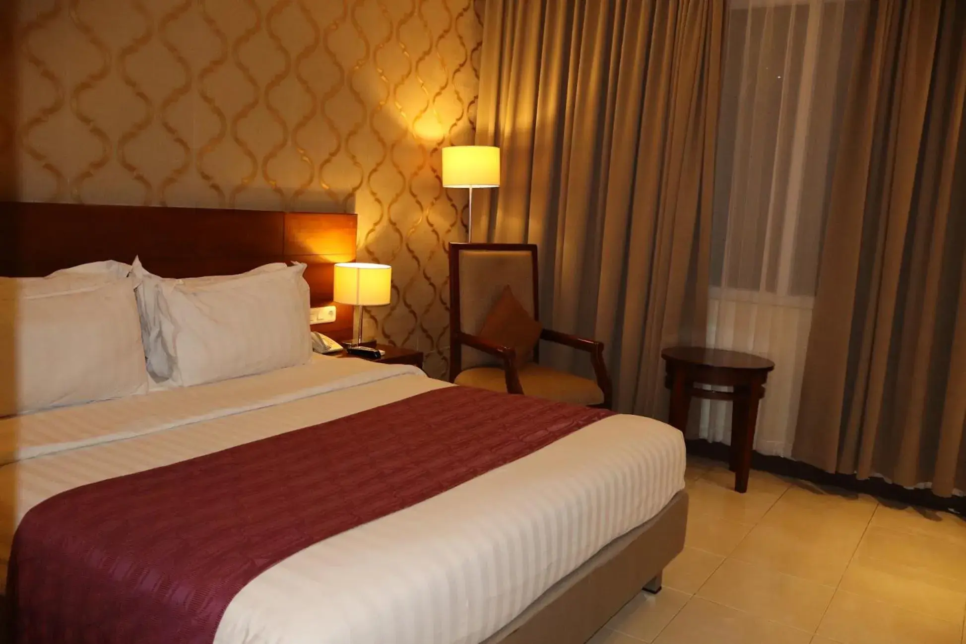 Bedroom, Bed in The Victoria Hotel Yogyakarta Bedroom, Bed in The Victoria Hotel Yogyakarta