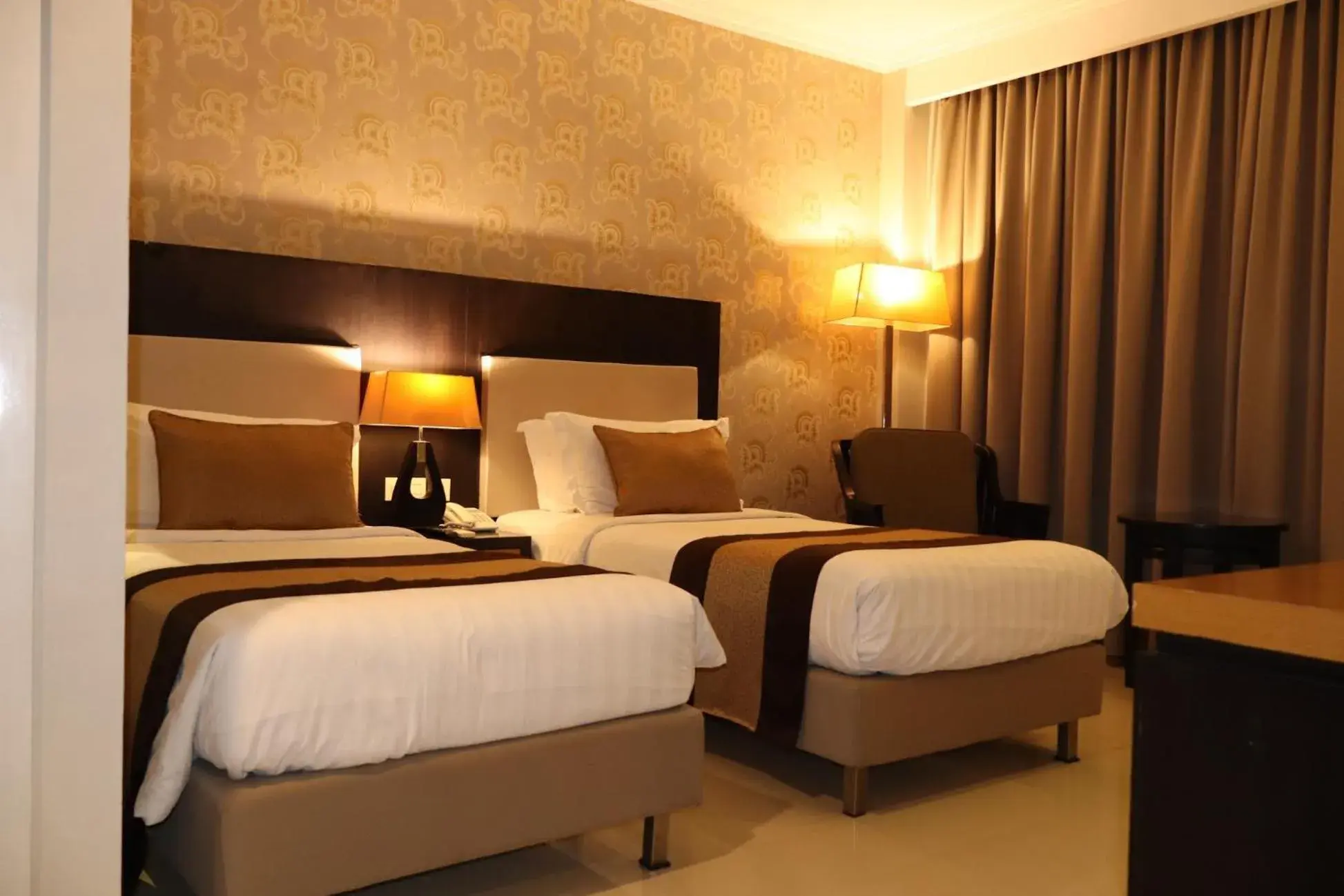 Bed in The Victoria Hotel Yogyakarta Bed in The Victoria Hotel Yogyakarta