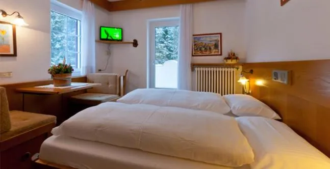 Bed in Chalet Pineta relax location