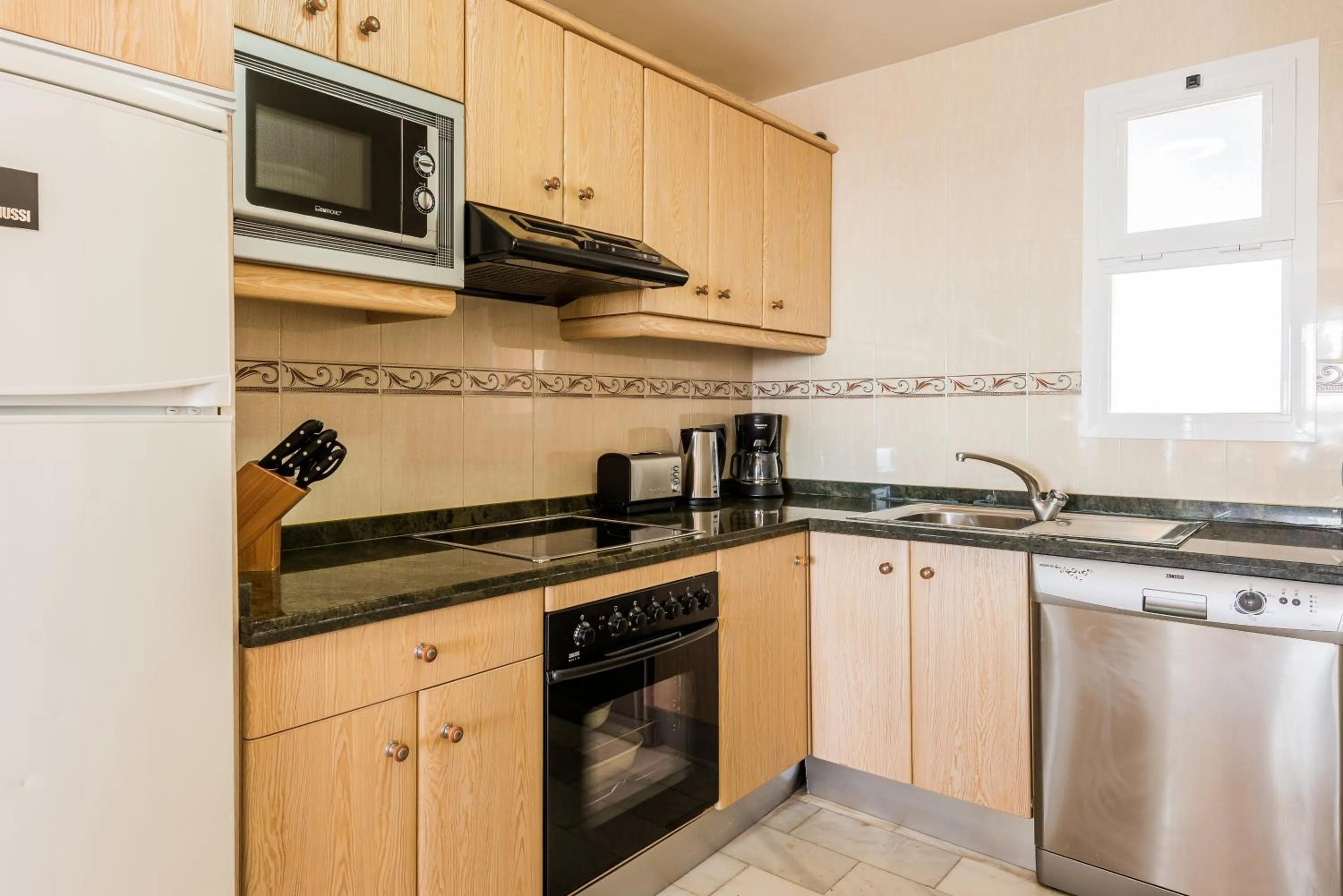 Kitchen or kitchenette in Macdonald Doña Lola Resort