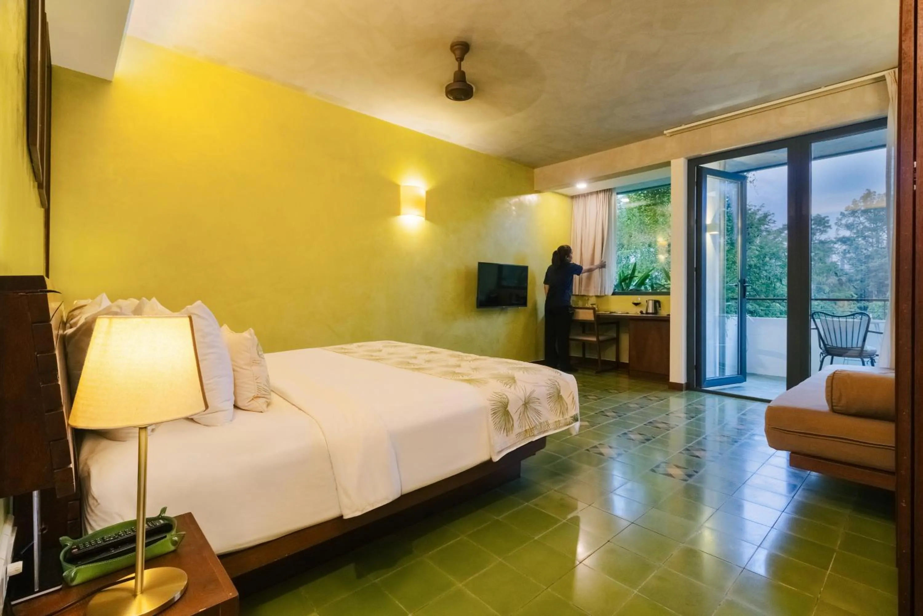 Bed in Penh House Hotel