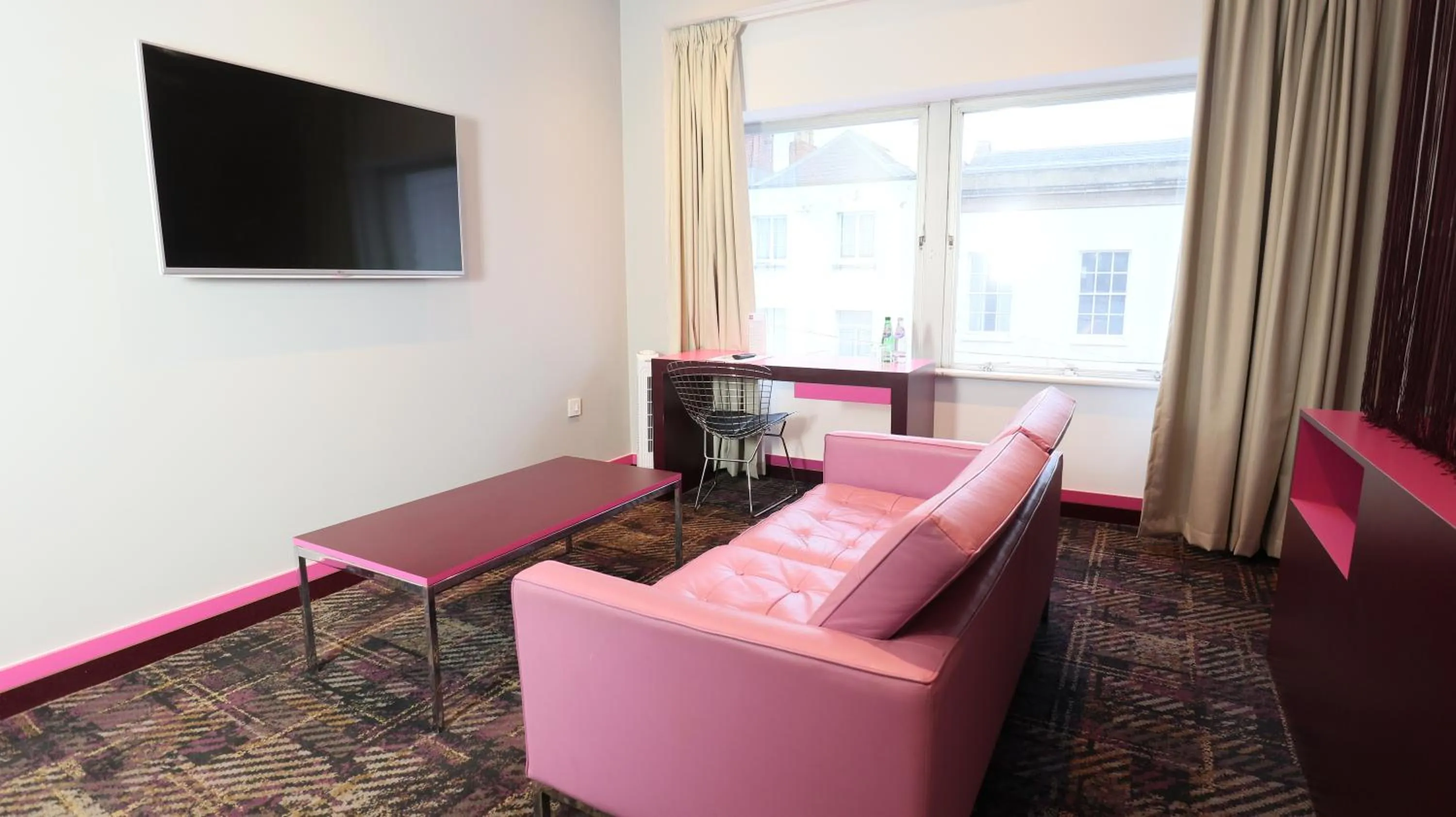 Seating area in Citrus Hotel Cheltenham by Compass Hospitality