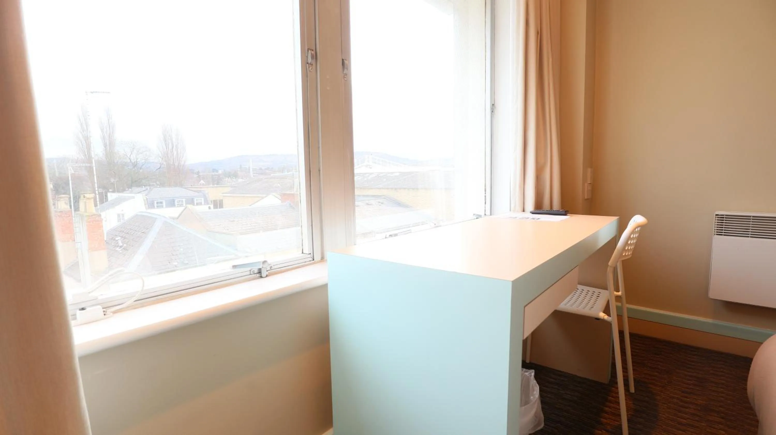 Seating area in Citrus Hotel Cheltenham by Compass Hospitality