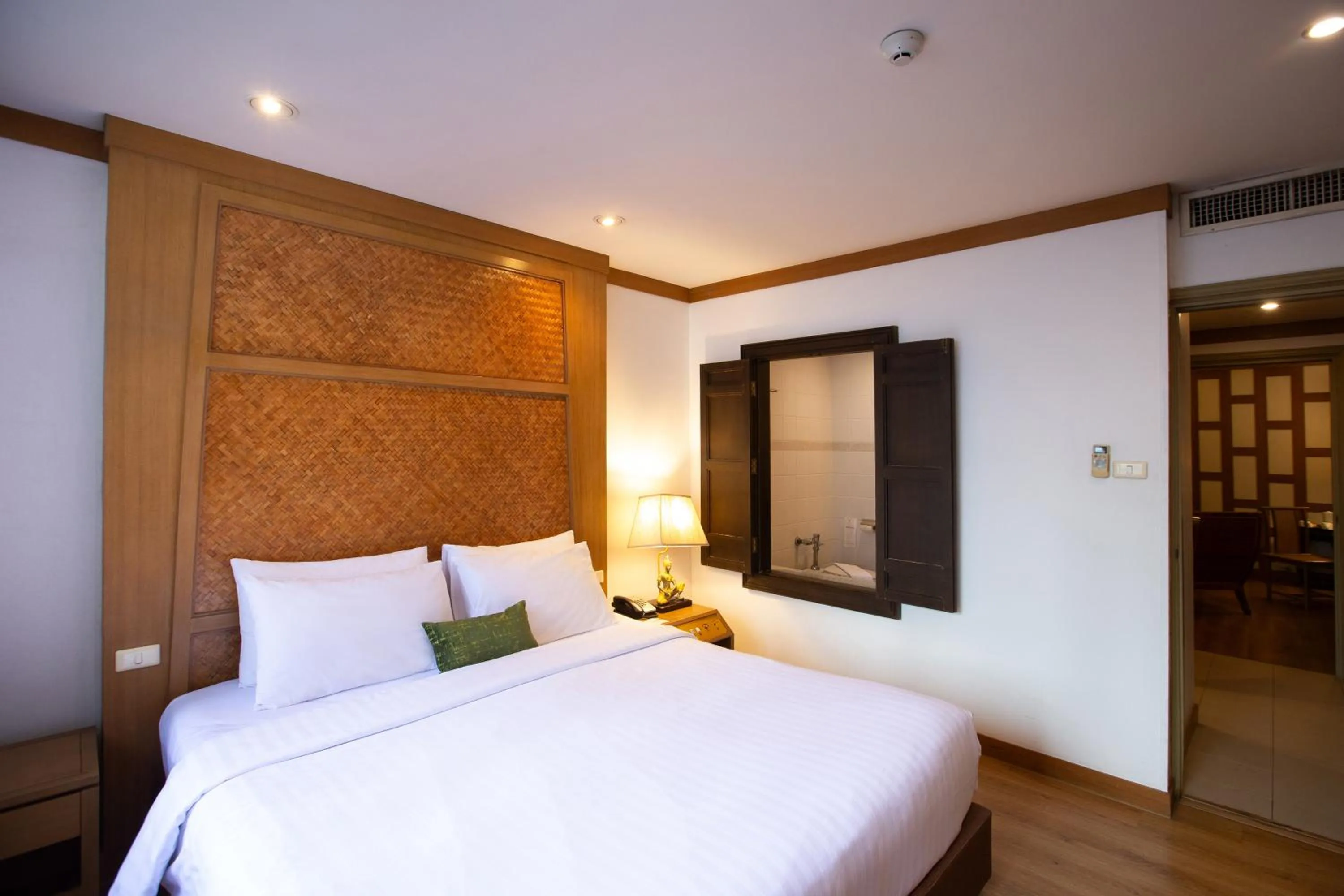 Bed in The Tarntawan Hotel Surawong Bangkok