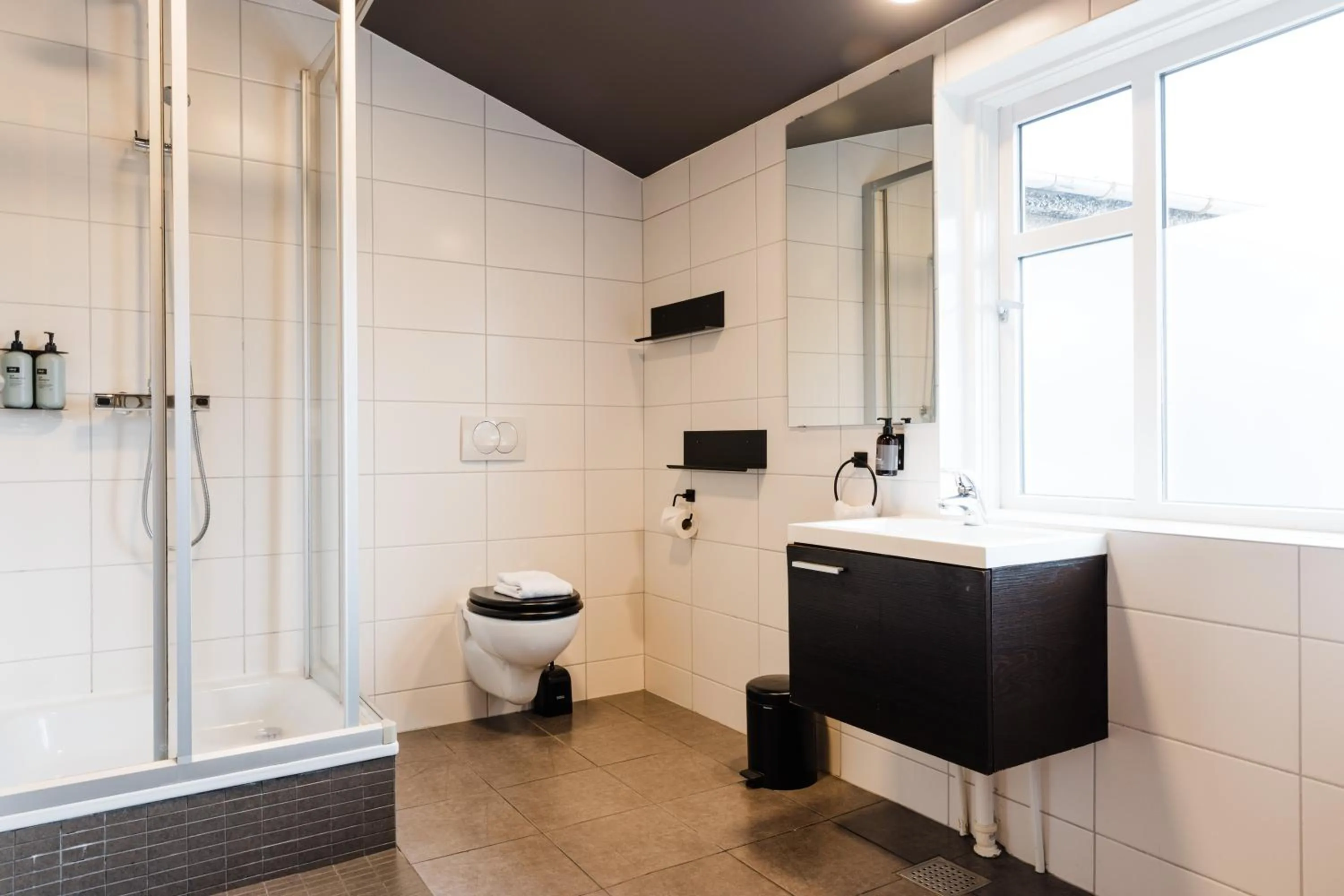 Bathroom in Rey Apartments