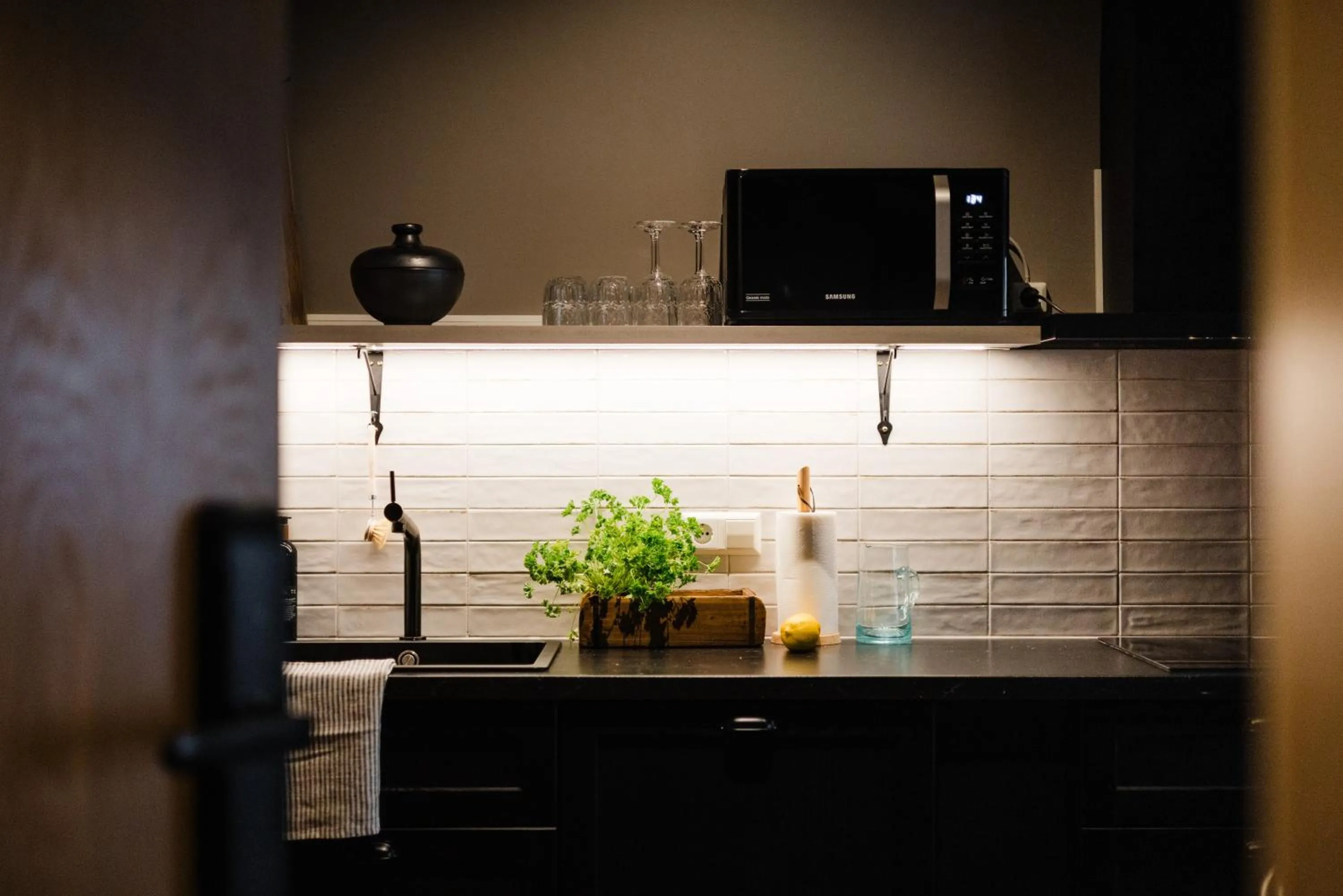 Kitchen or kitchenette in Rey Apartments