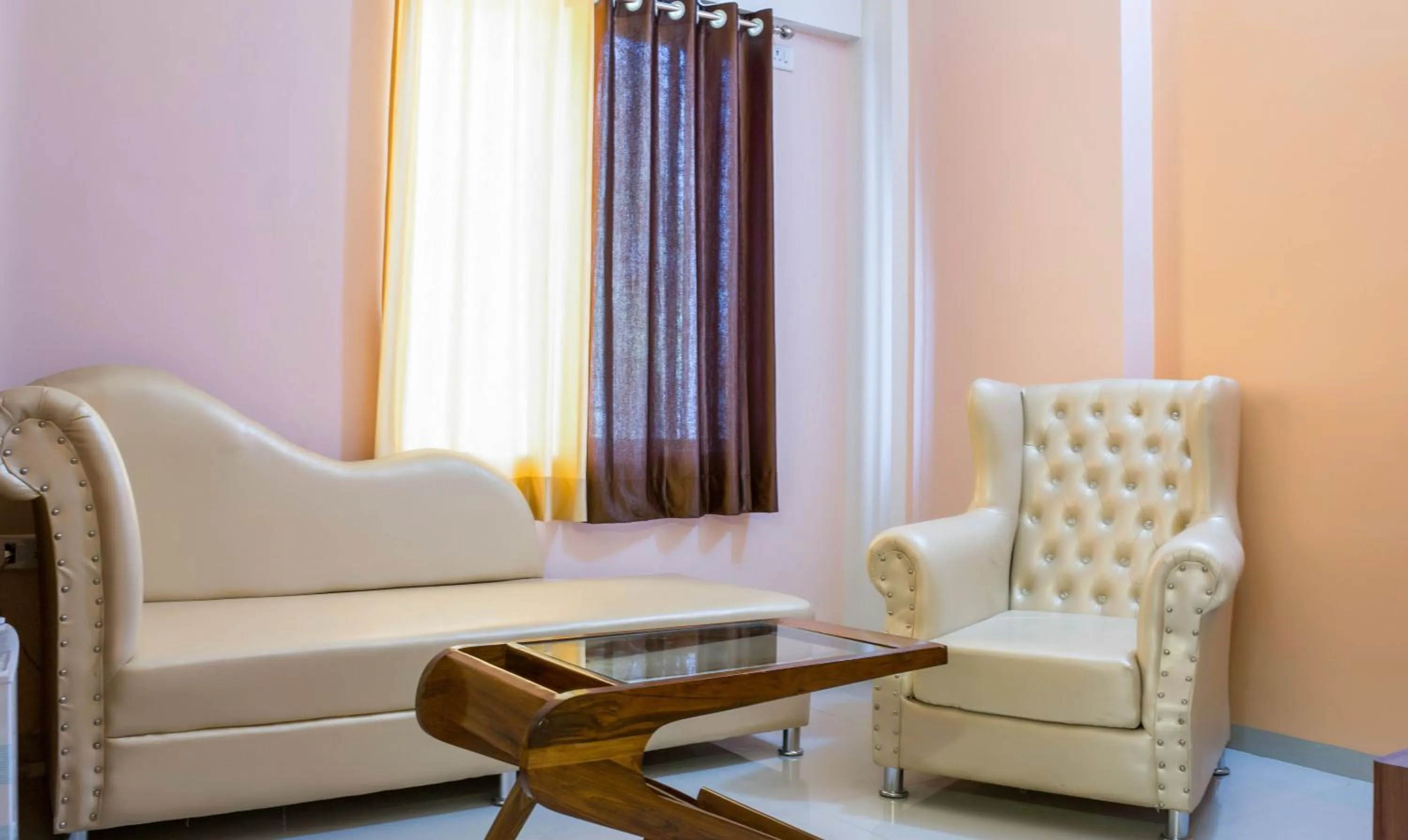 Seating area in Treebo Naunidh Suites