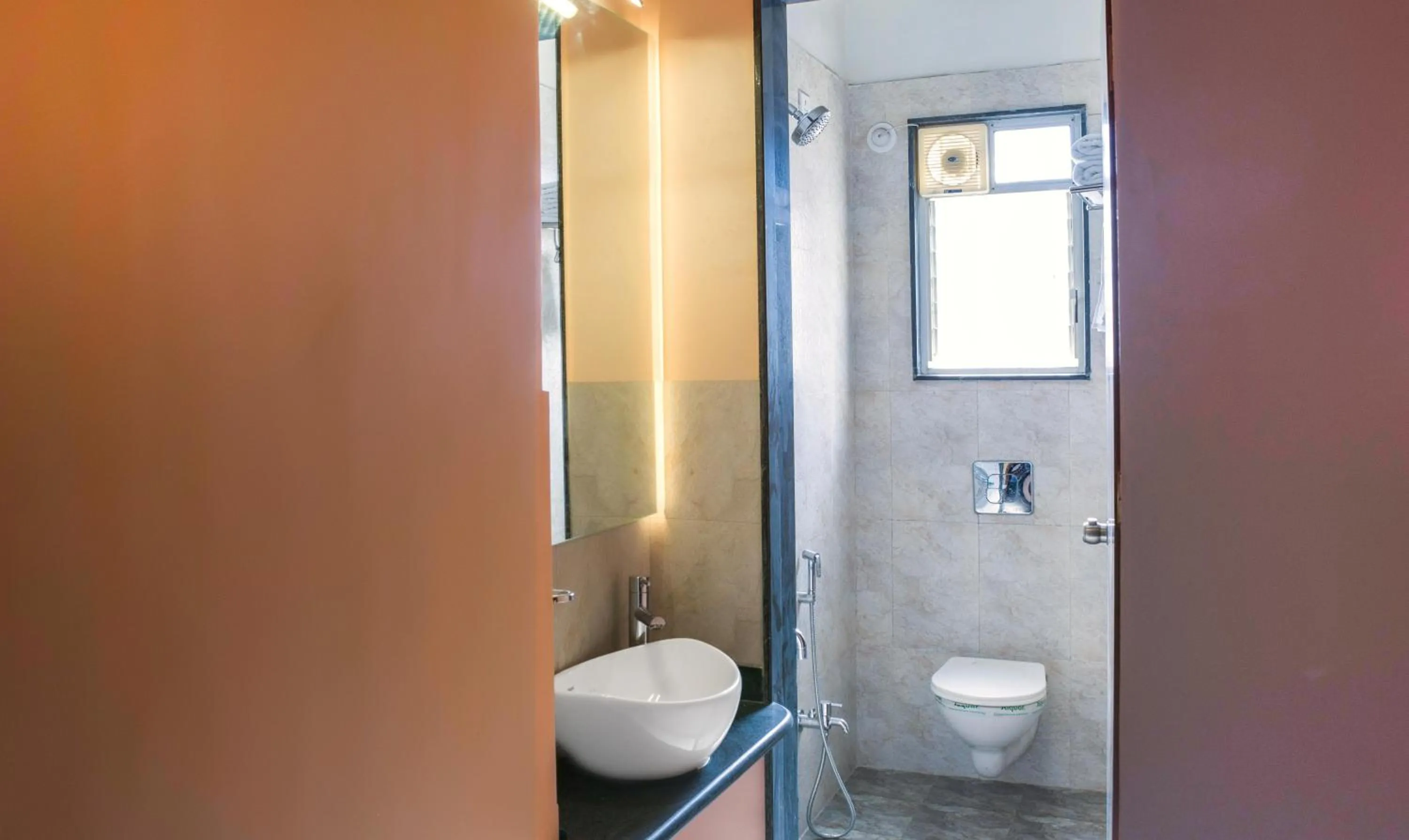 Toilet in Treebo Naunidh Suites