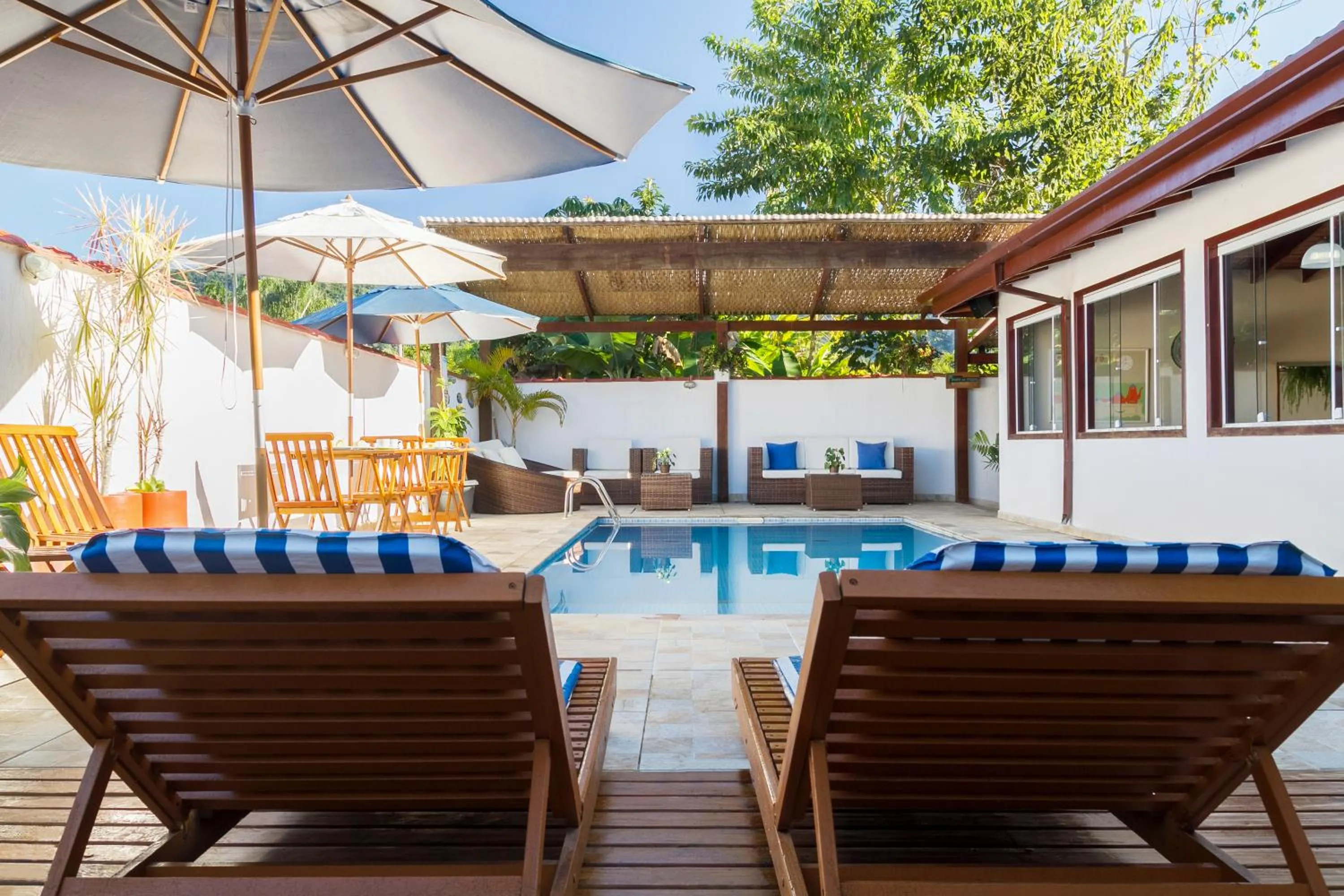 Swimming pool in Pousada Recanto do Jabaquara