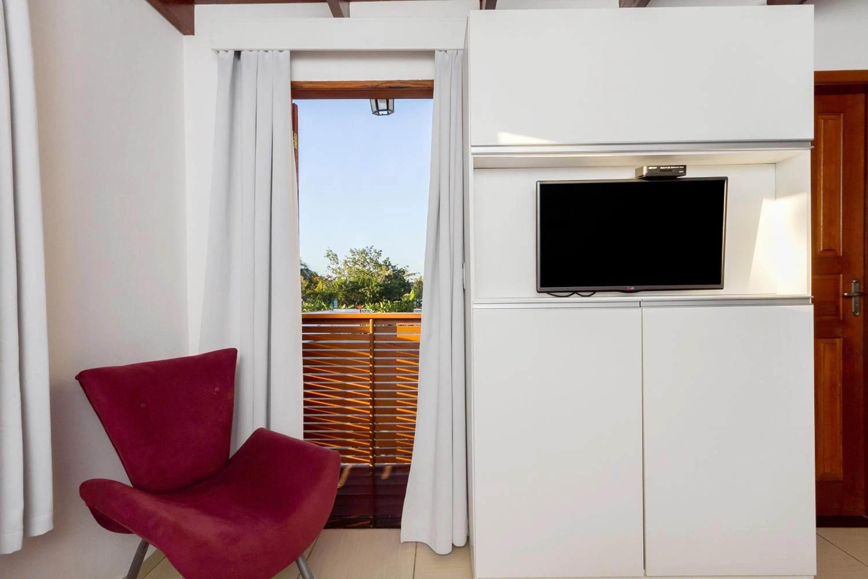 TV and multimedia in Pousada Recanto do Jabaquara