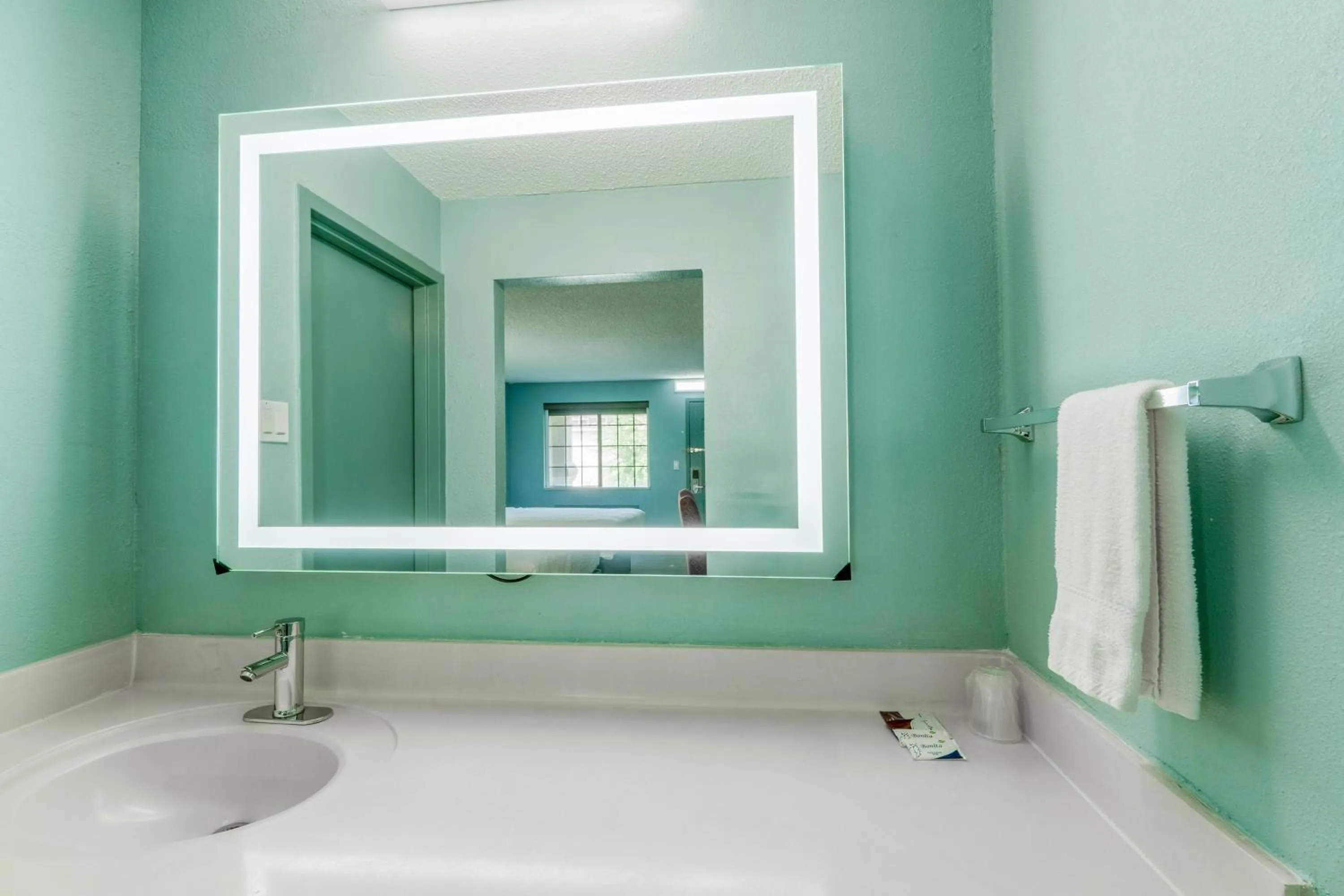 Bathroom in Lone Star Inn & Suites by OYO Harlingen TX