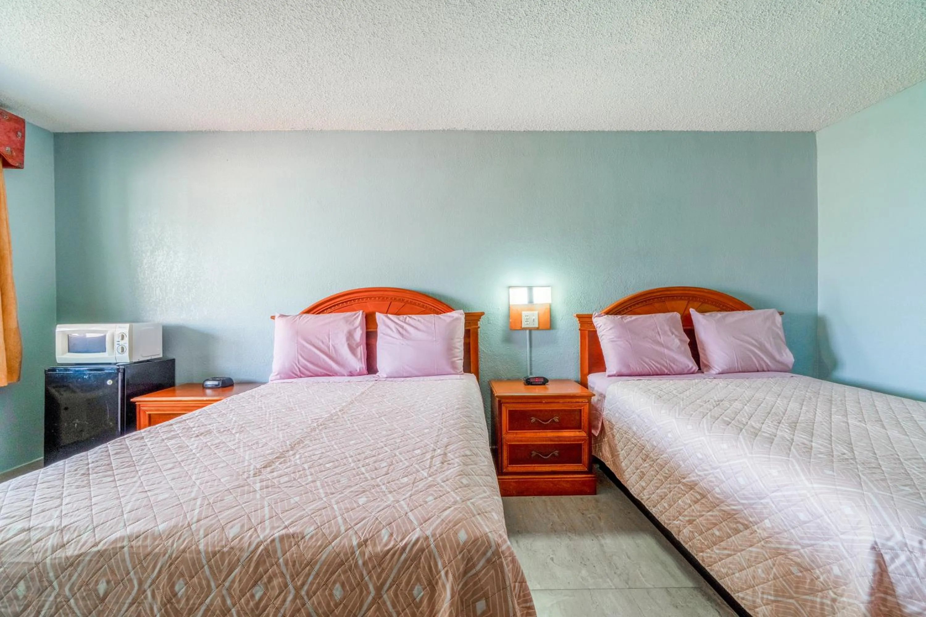 Bedroom, Bed in Lone Star Inn & Suites by OYO Harlingen TX